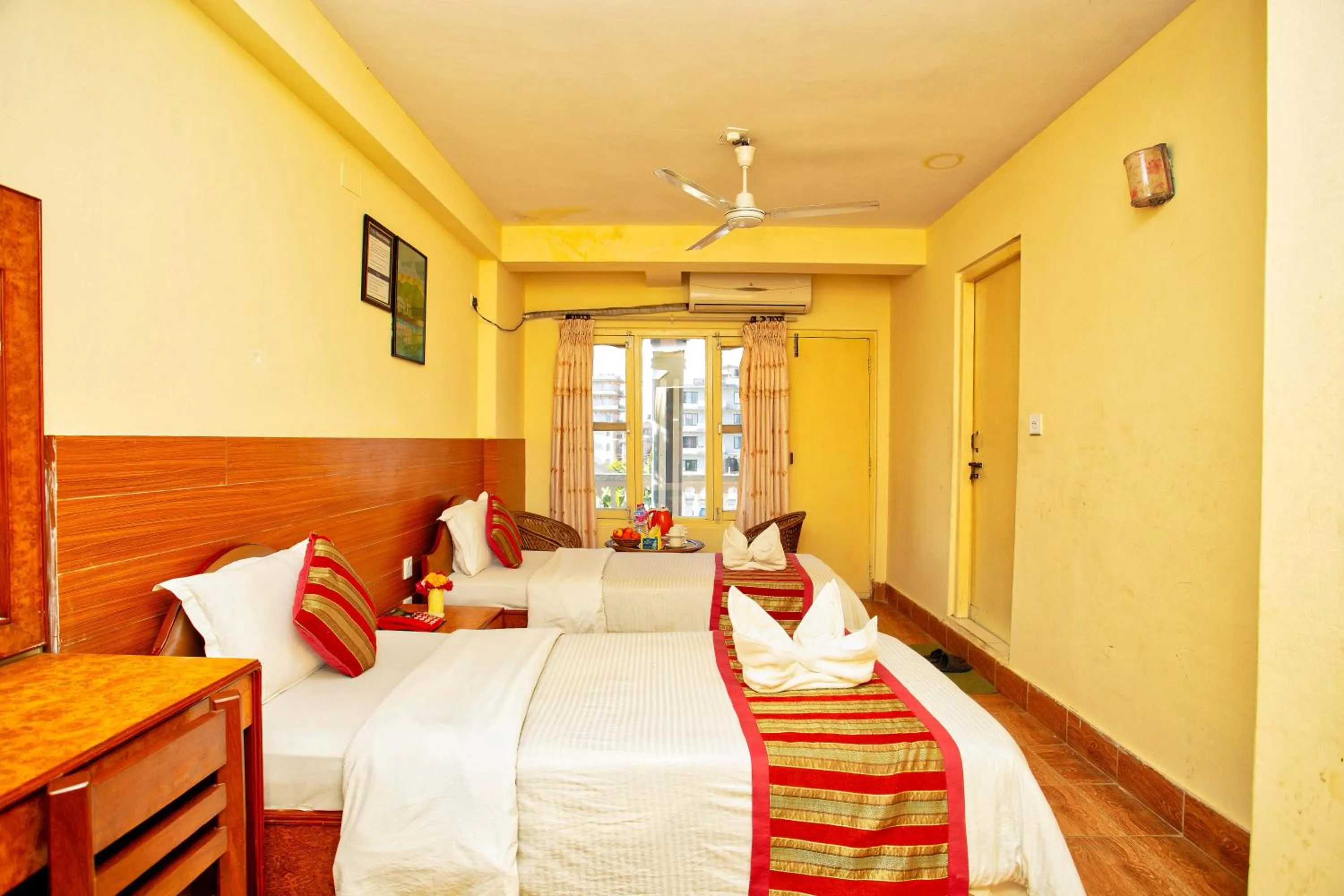 Bed in Hotel Grand Holiday