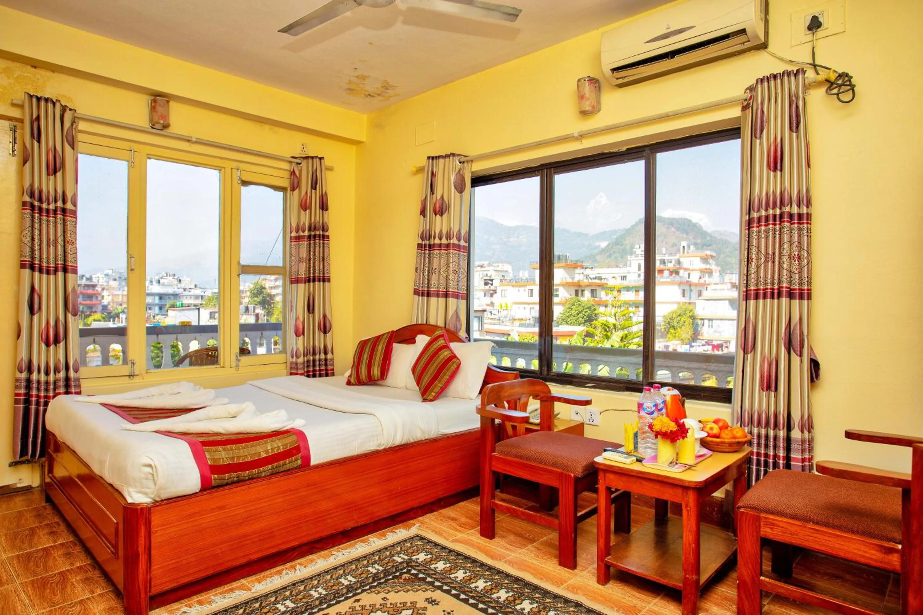 Bed in Hotel Grand Holiday