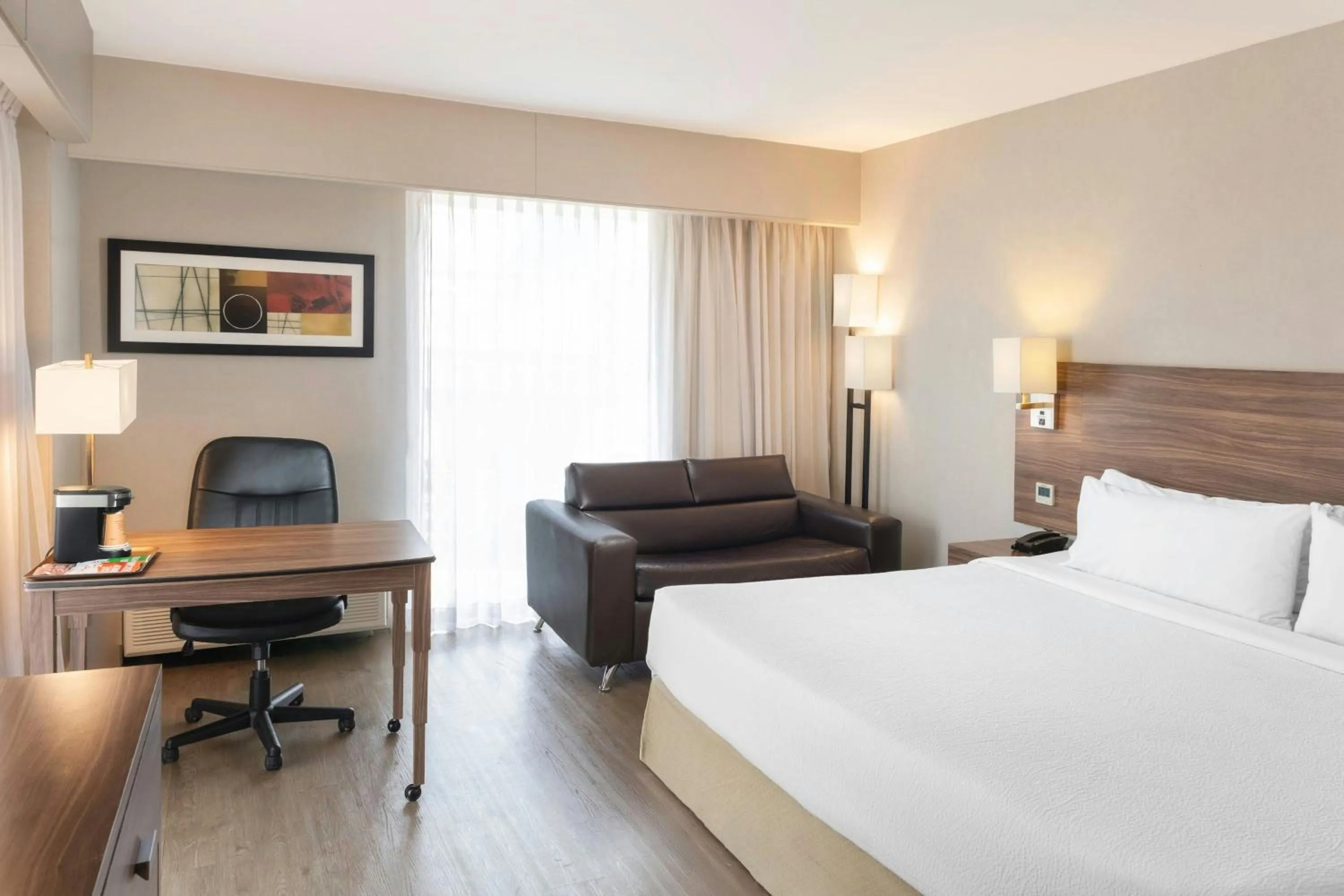 Photo of the whole room, Bed in Courtyard by Marriott Puebla Las Animas