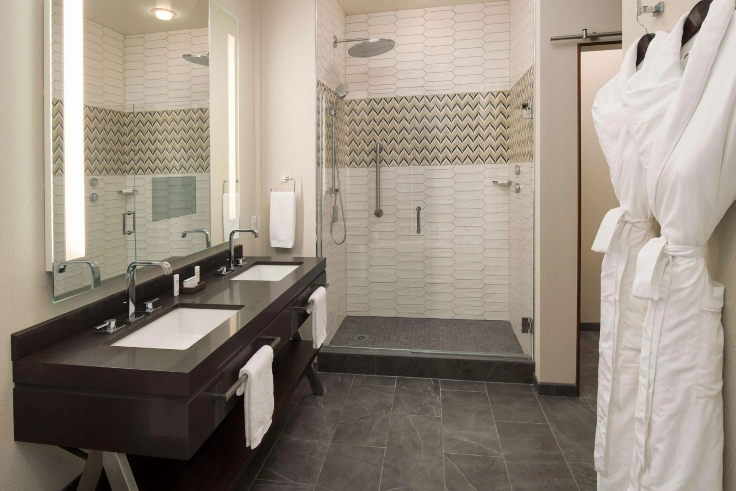 Bathroom in Embassy Suites By Hilton Seattle Downtown Pioneer Square