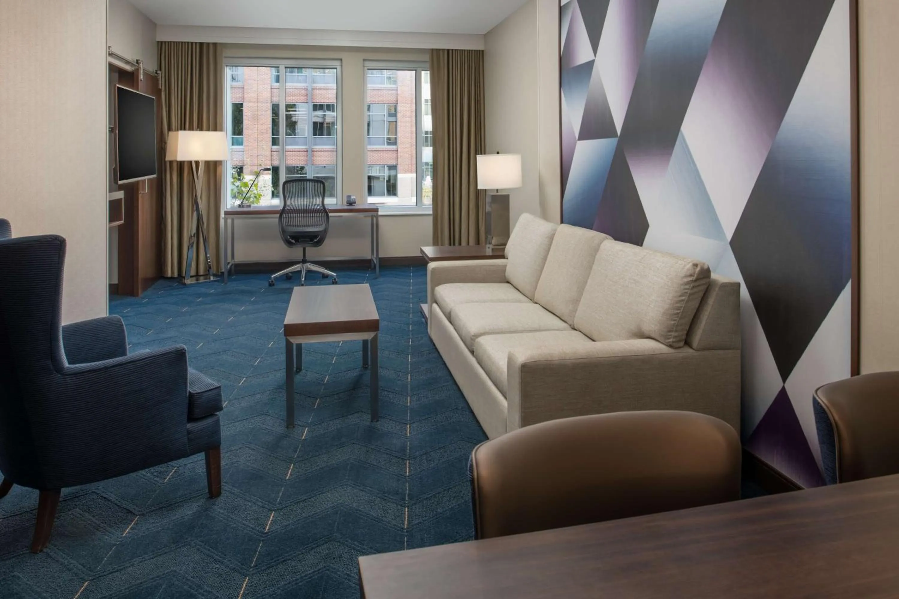 Living room in Embassy Suites By Hilton Seattle Downtown Pioneer Square