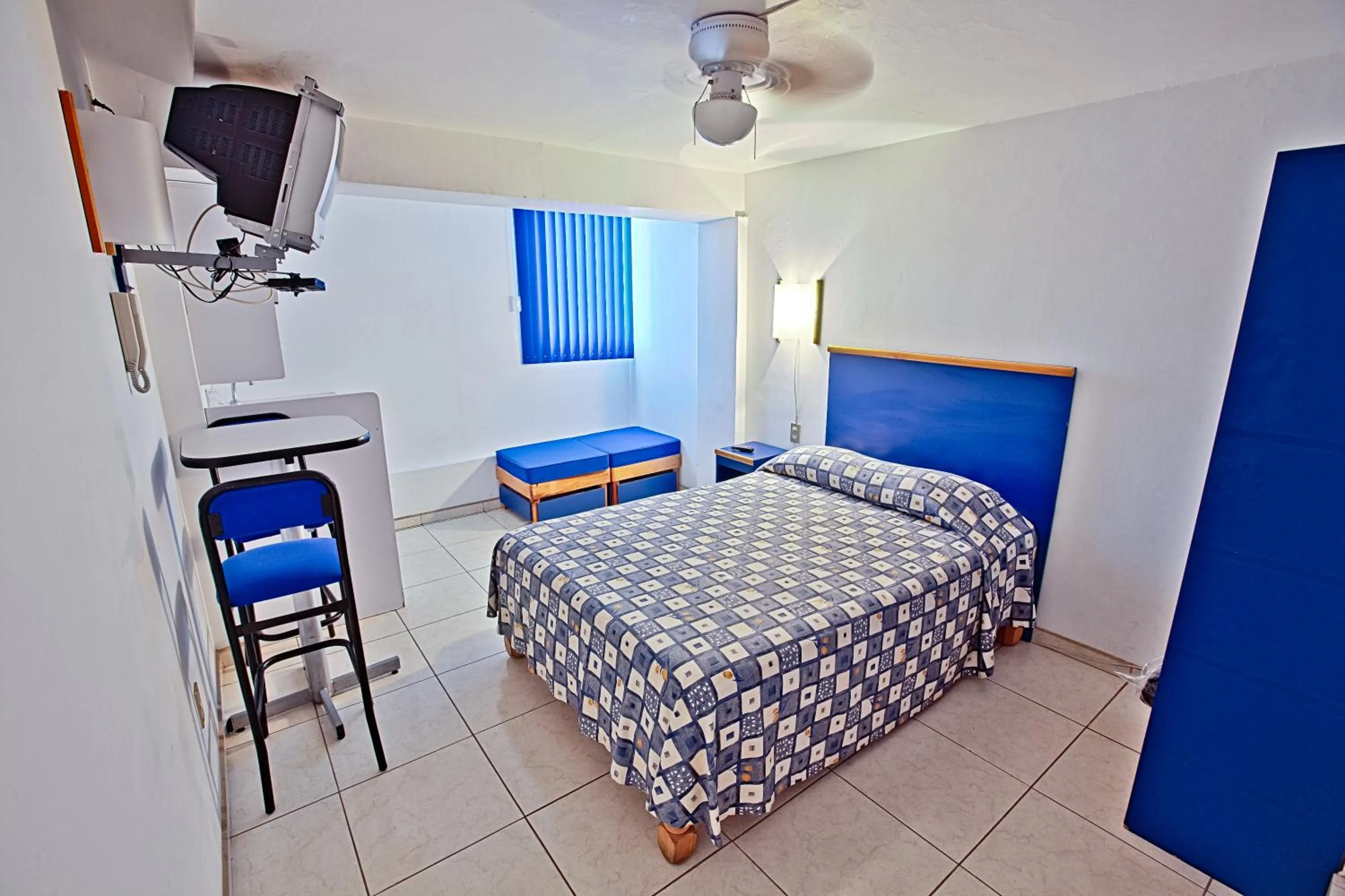 Bed in Hotel H Americas