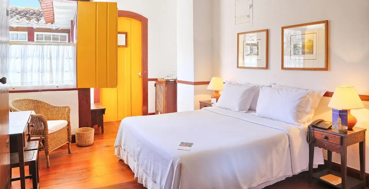 Bed in Pousada do Ouro