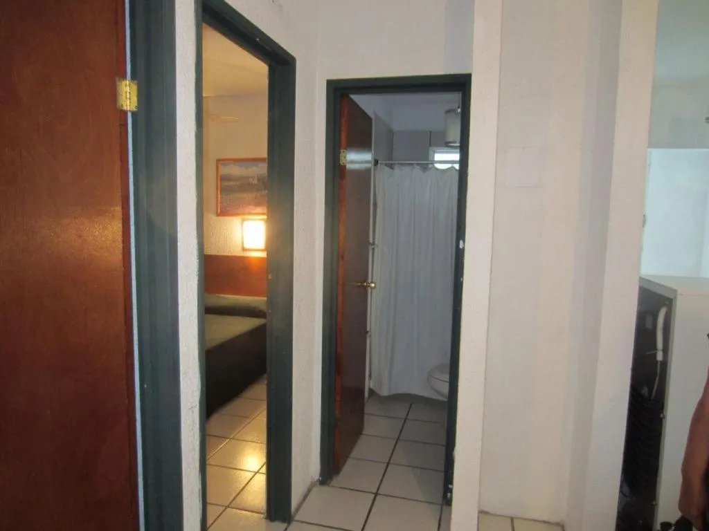 Bed in Hotel Vagabundo Puerto Vallarta