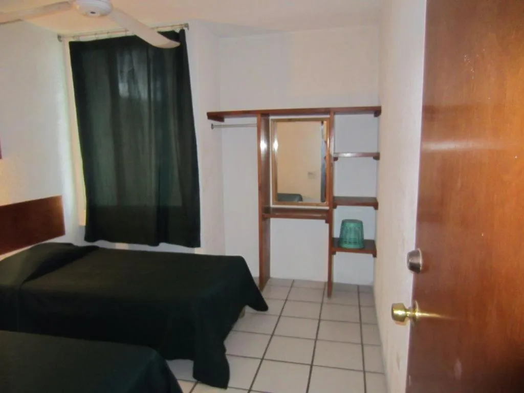 Bed in Hotel Vagabundo Puerto Vallarta