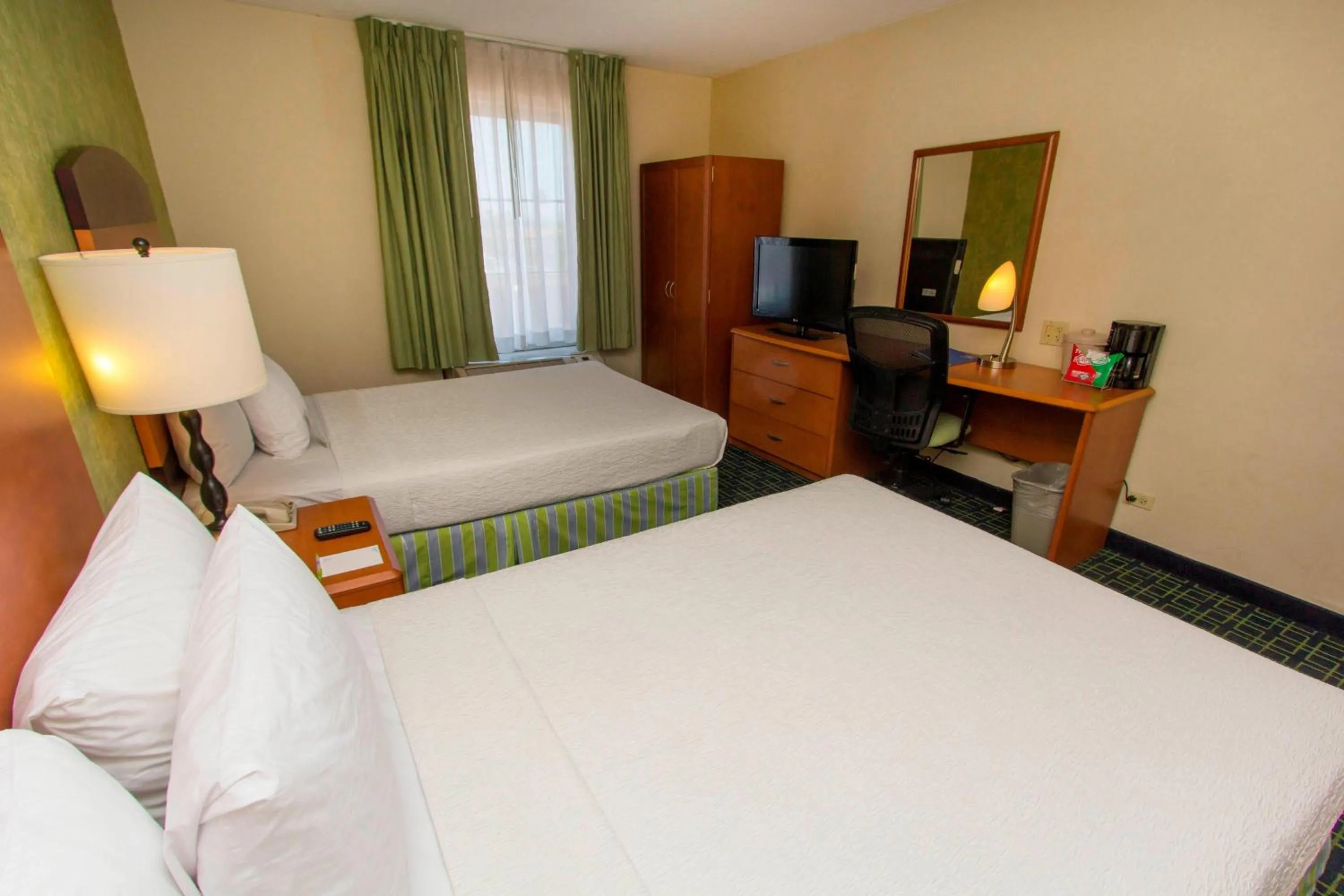 Photo of the whole room, Bed in Wyndham Garden Monterrey Aeropuerto