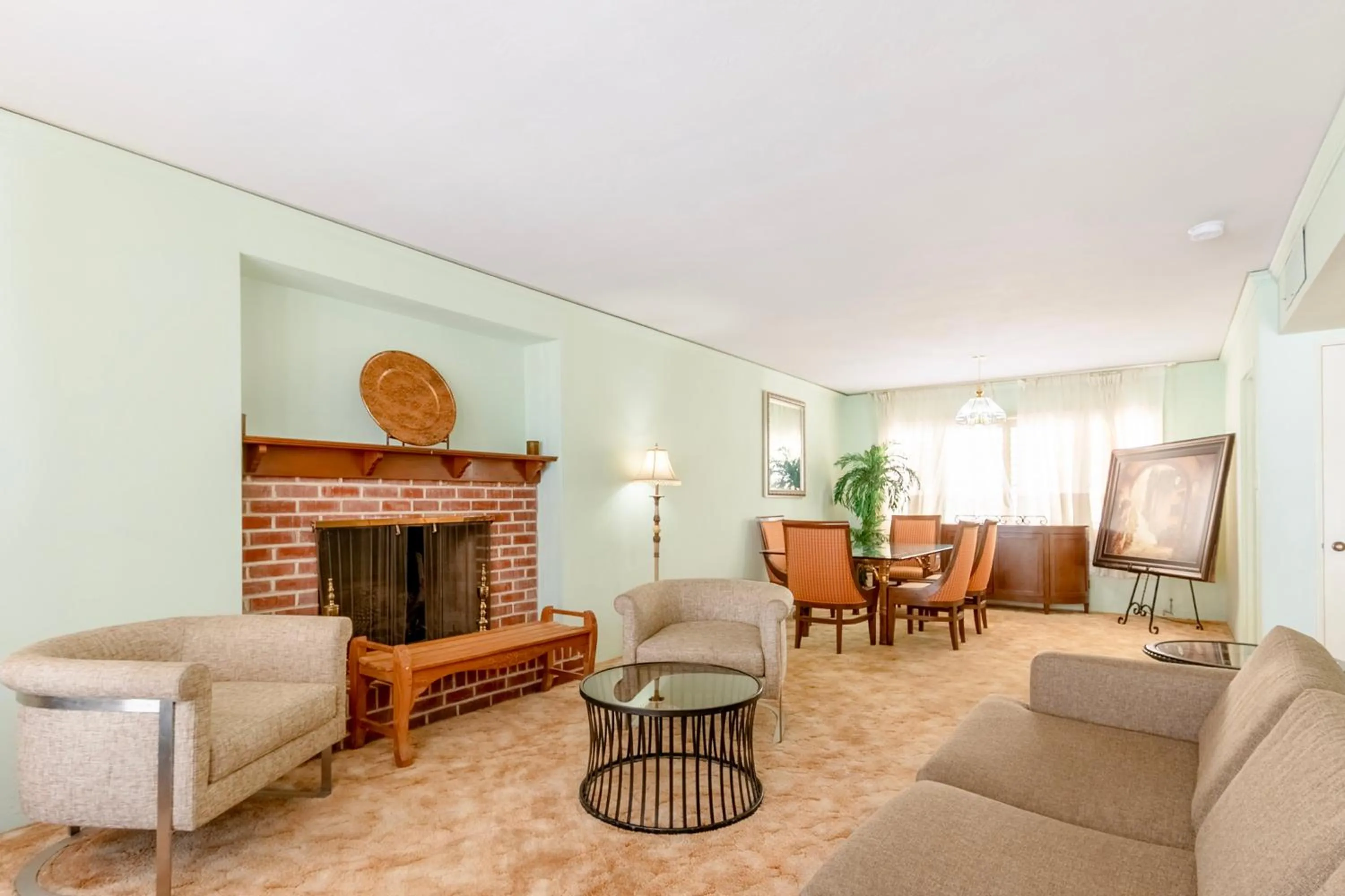 Seating area in Historic Coronado Motor Hotel by OYO