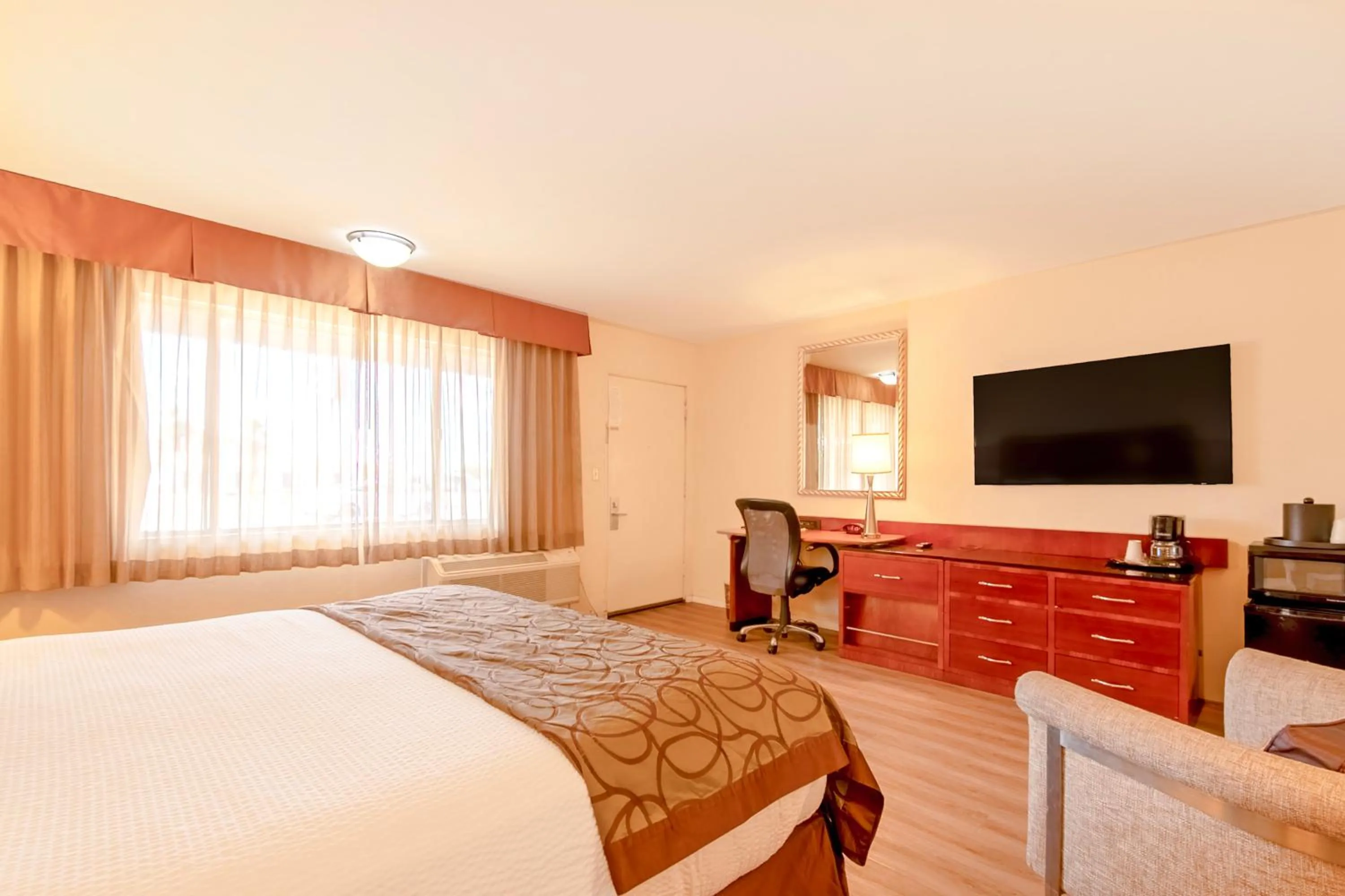 Bed in Historic Coronado Motor Hotel by OYO