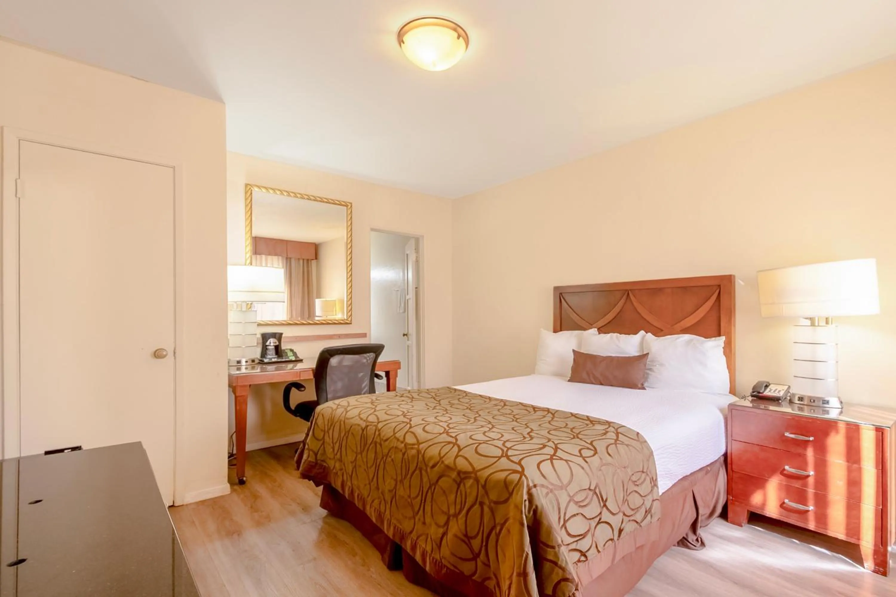 Bedroom, Bed in Historic Coronado Motor Hotel by OYO