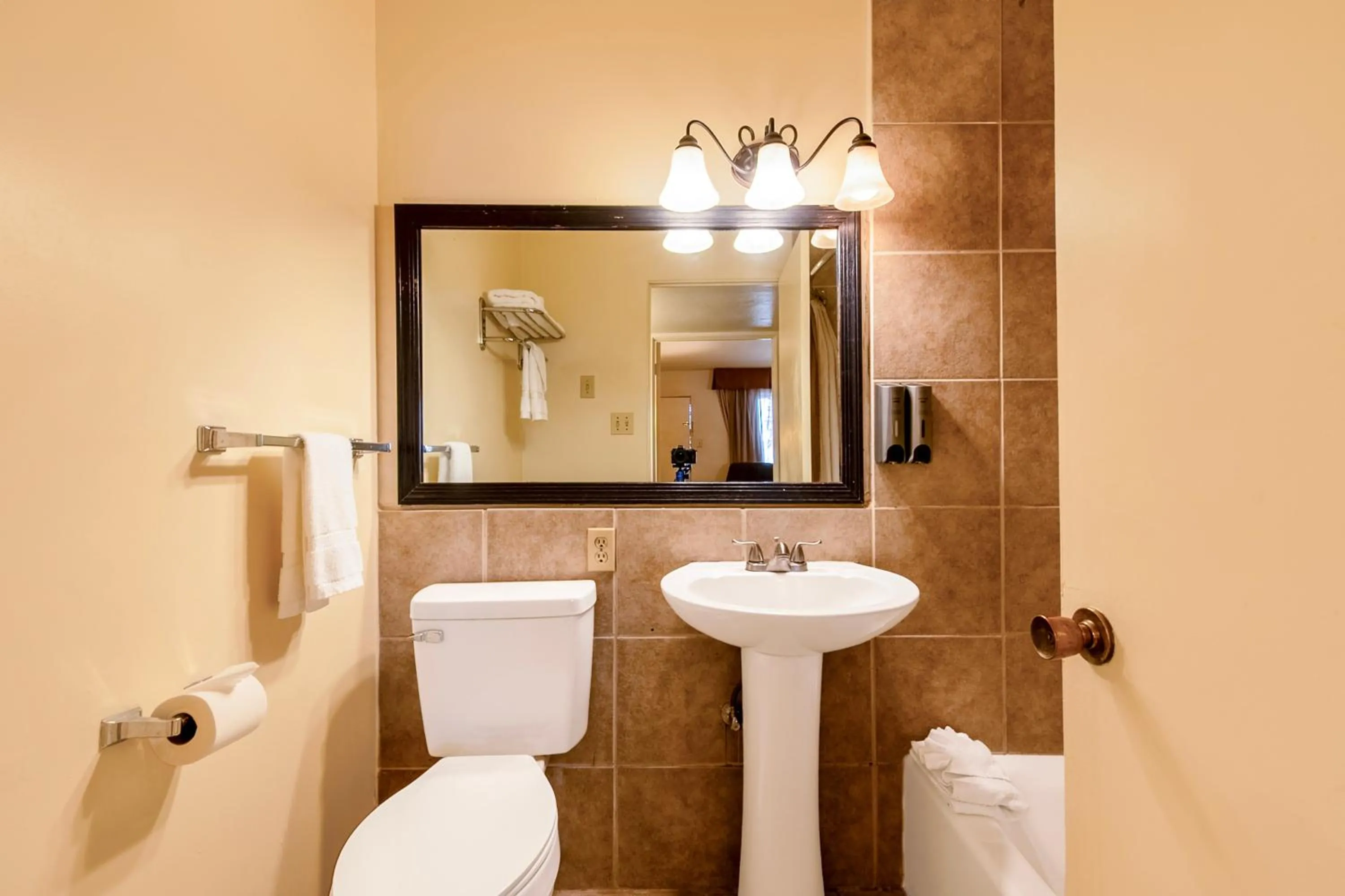 Bathroom in Historic Coronado Motor Hotel by OYO