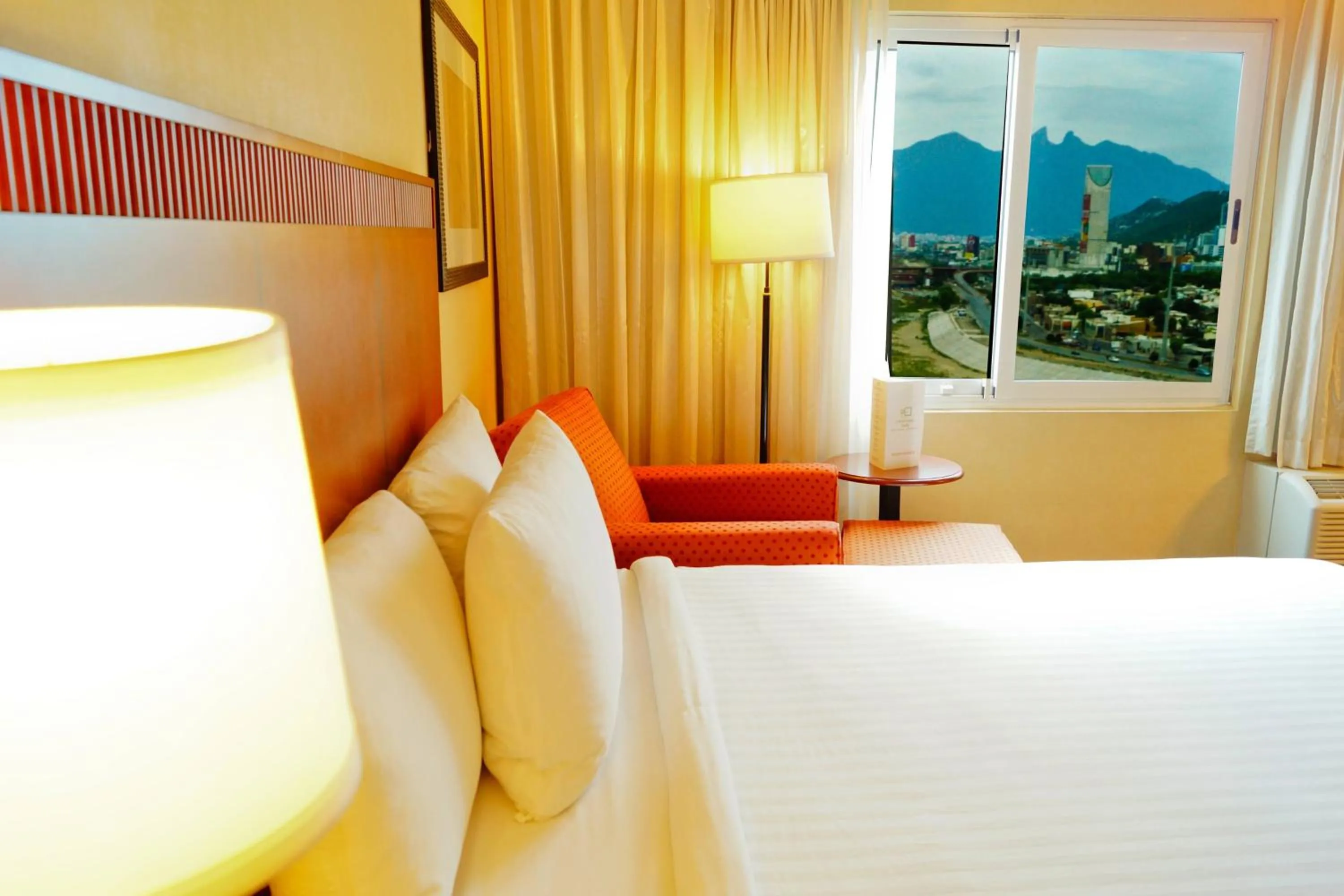 Photo of the whole room, Bed in Courtyard Monterrey San Jeronimo