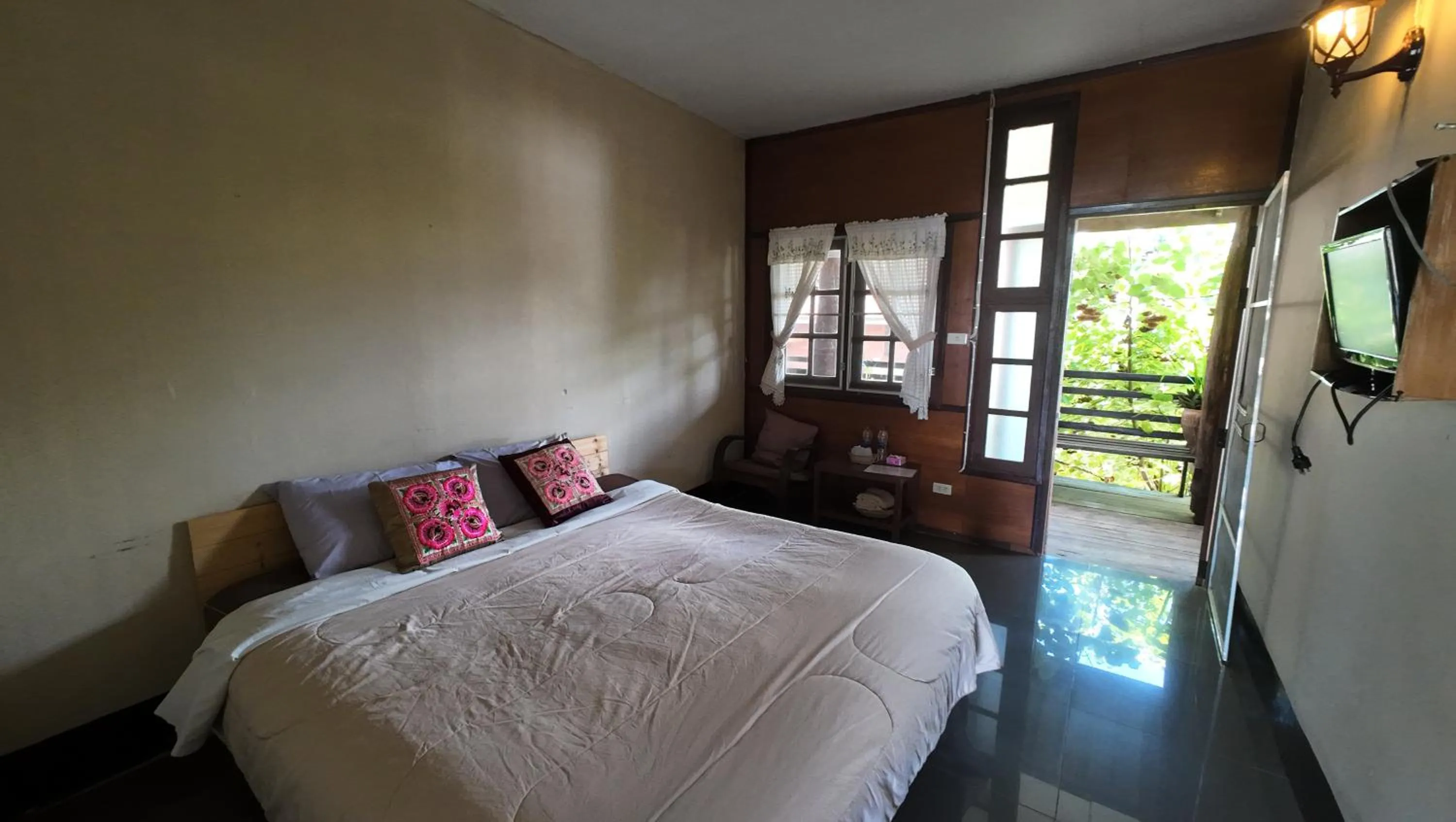 Bed in Baantawan Guesthouse Pai