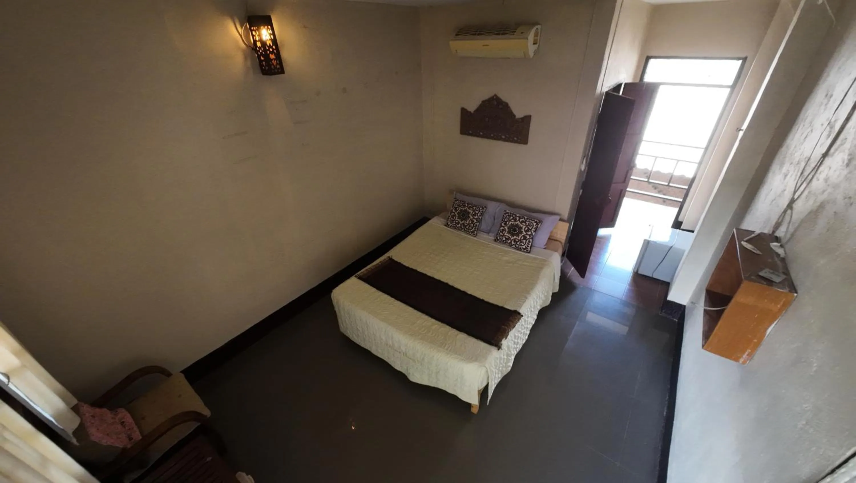 Bed in Baantawan Guesthouse Pai