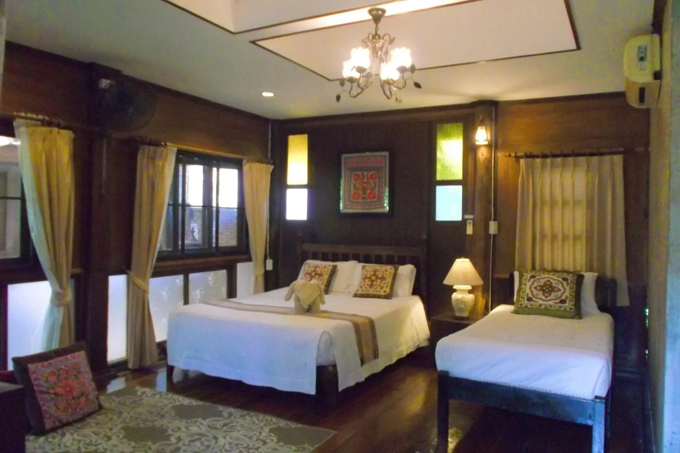 Photo of the whole room, Bed in Baantawan Guesthouse Pai