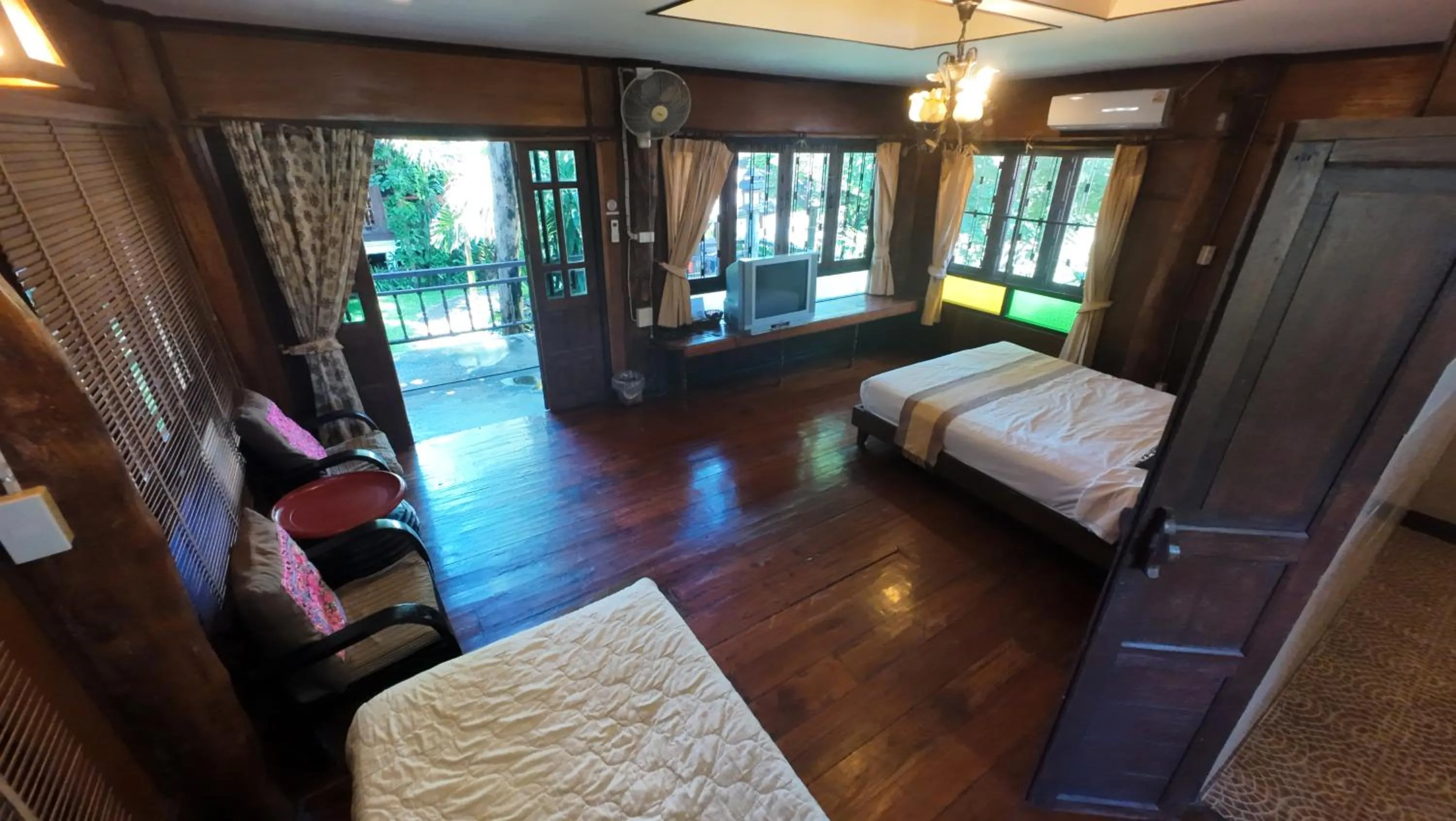 Bed in Baantawan Guesthouse Pai