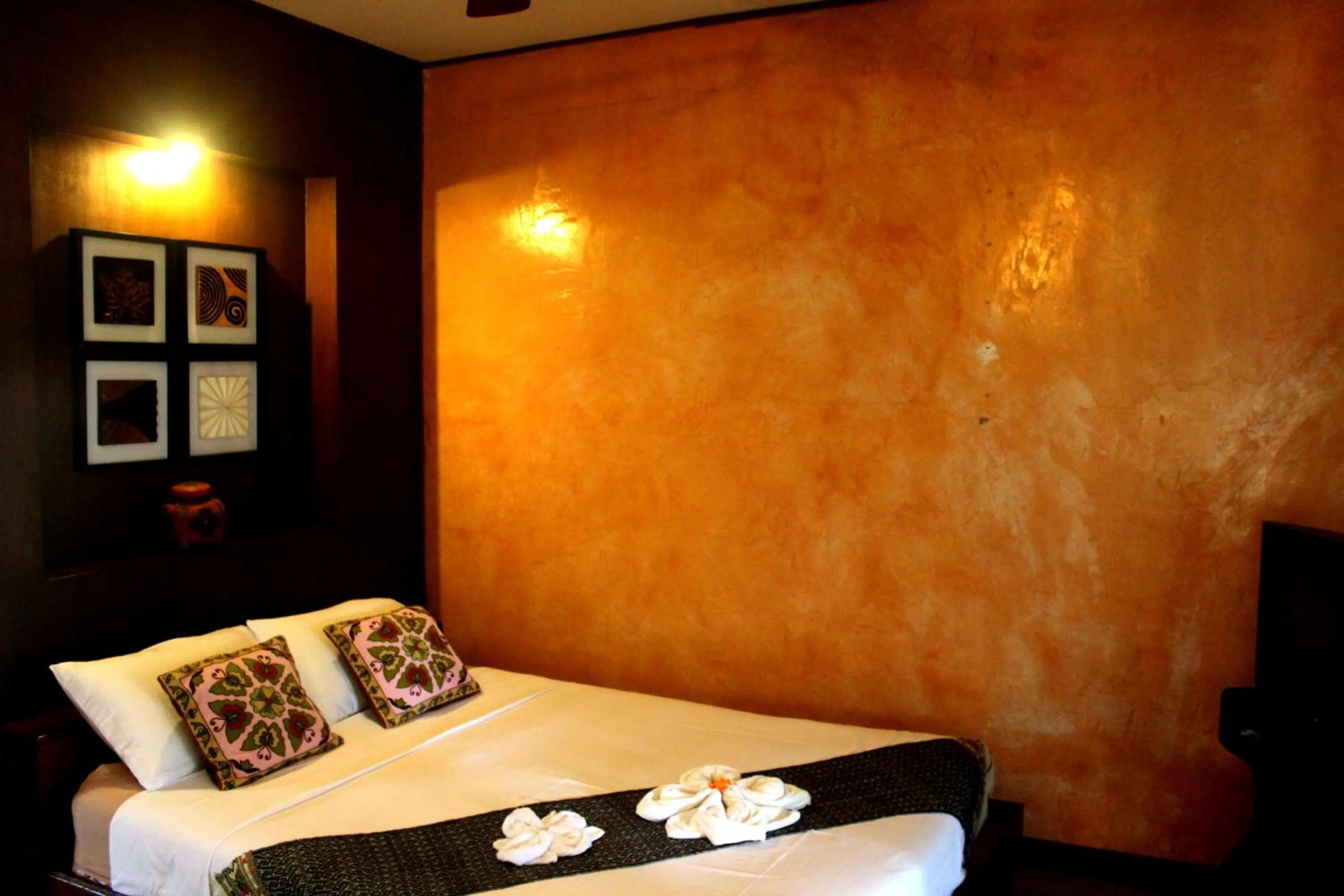 Bed in Baantawan Guesthouse Pai