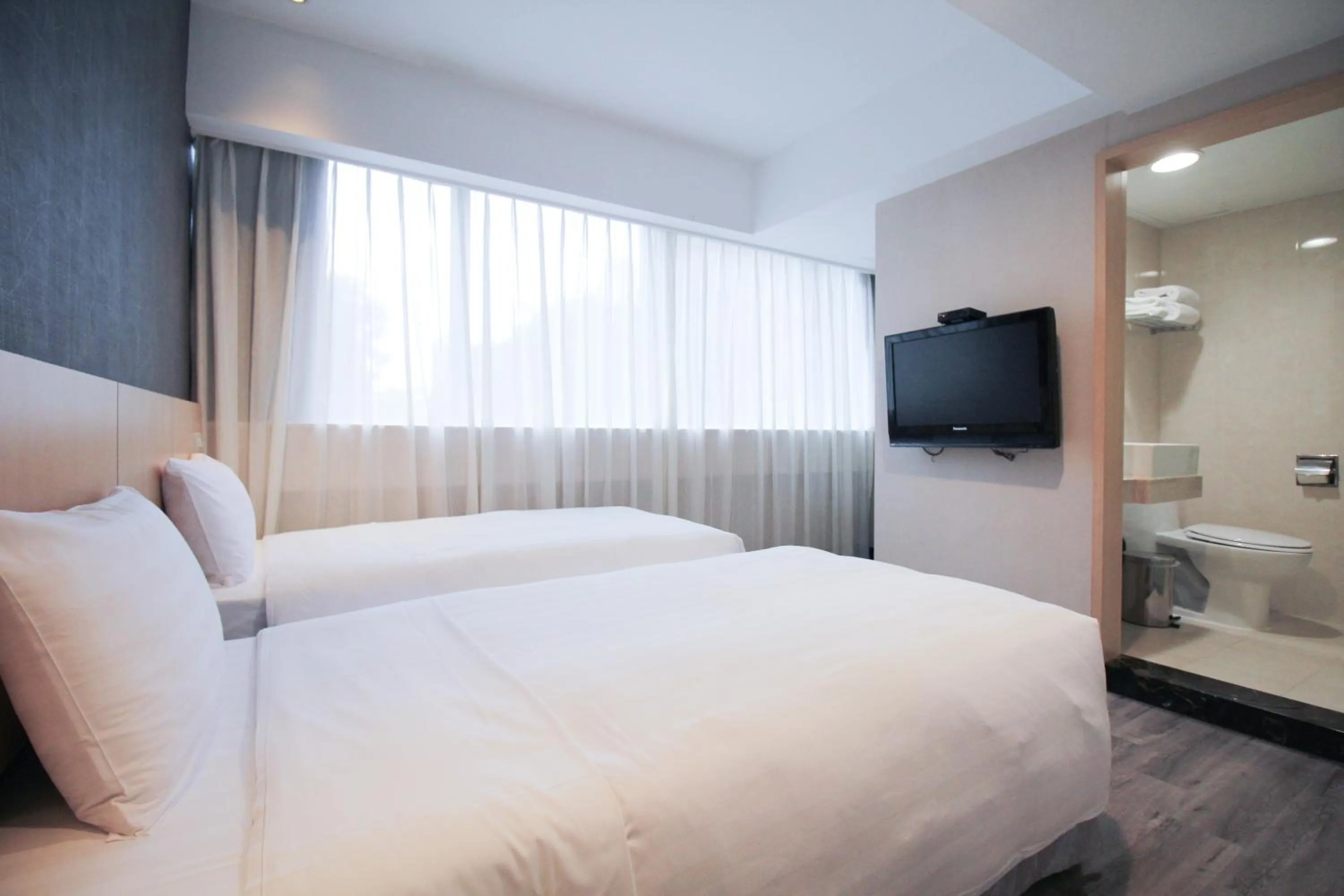 Bed in 台北碧瑤飯店 Hotel B