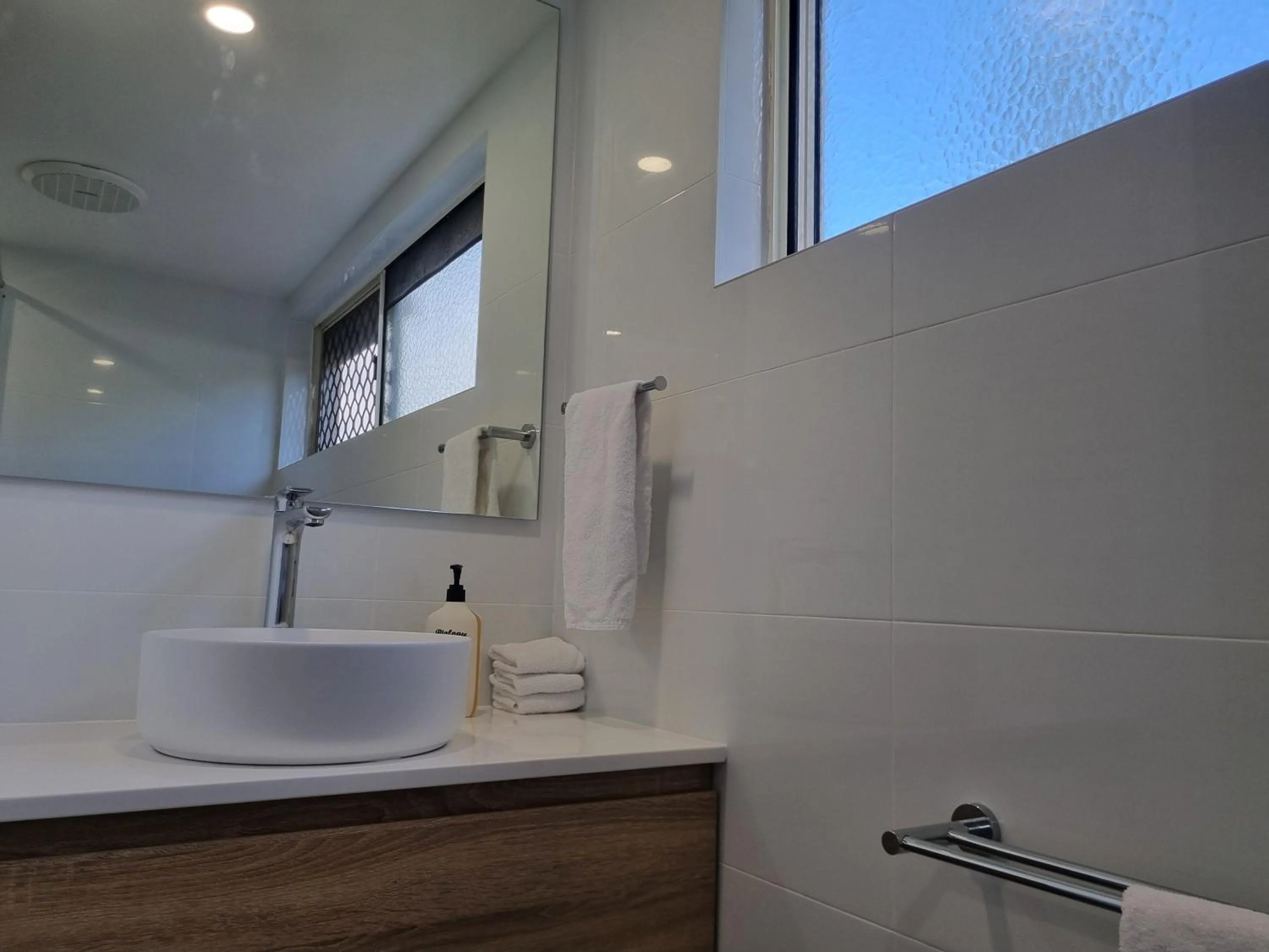 Shower in Noosa Sun - On the Noosa River