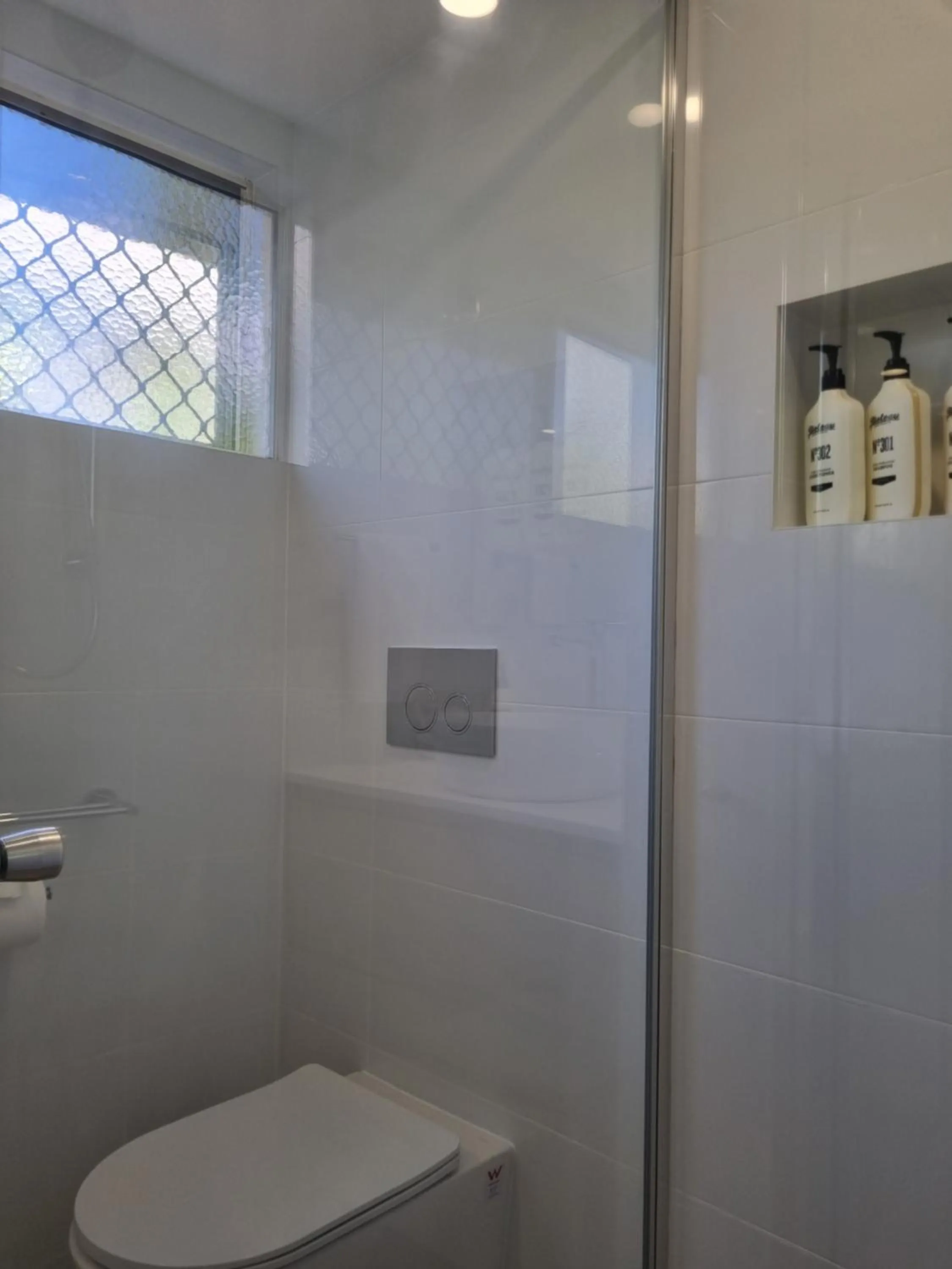 Shower in Noosa Sun - On the Noosa River