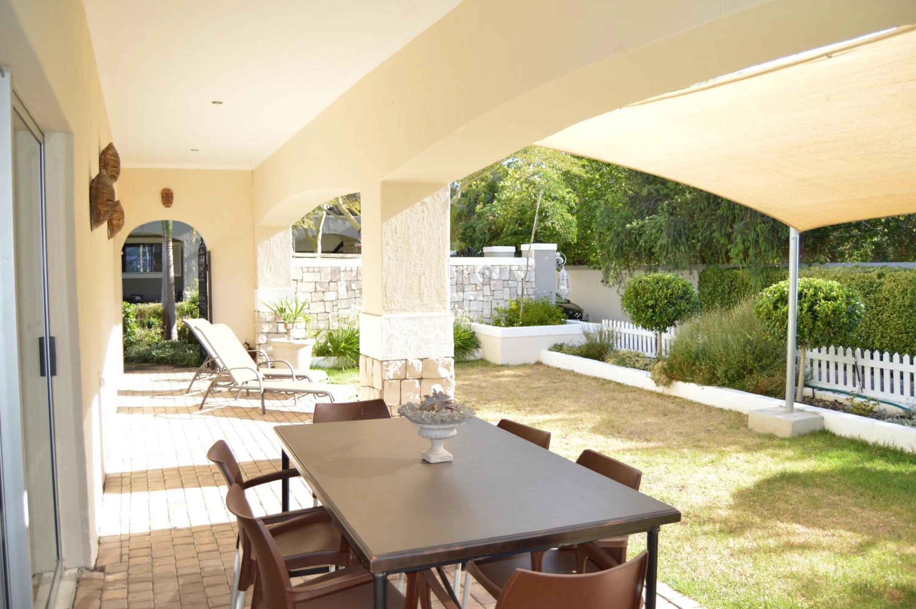 Balcony/Terrace in African Palm Cottage and Guesthouse