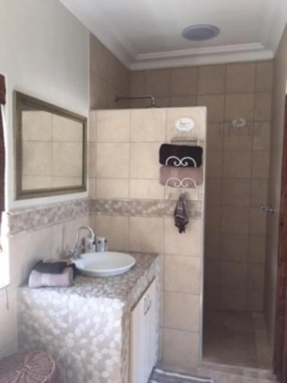 Bathroom in African Palm Cottage and Guesthouse