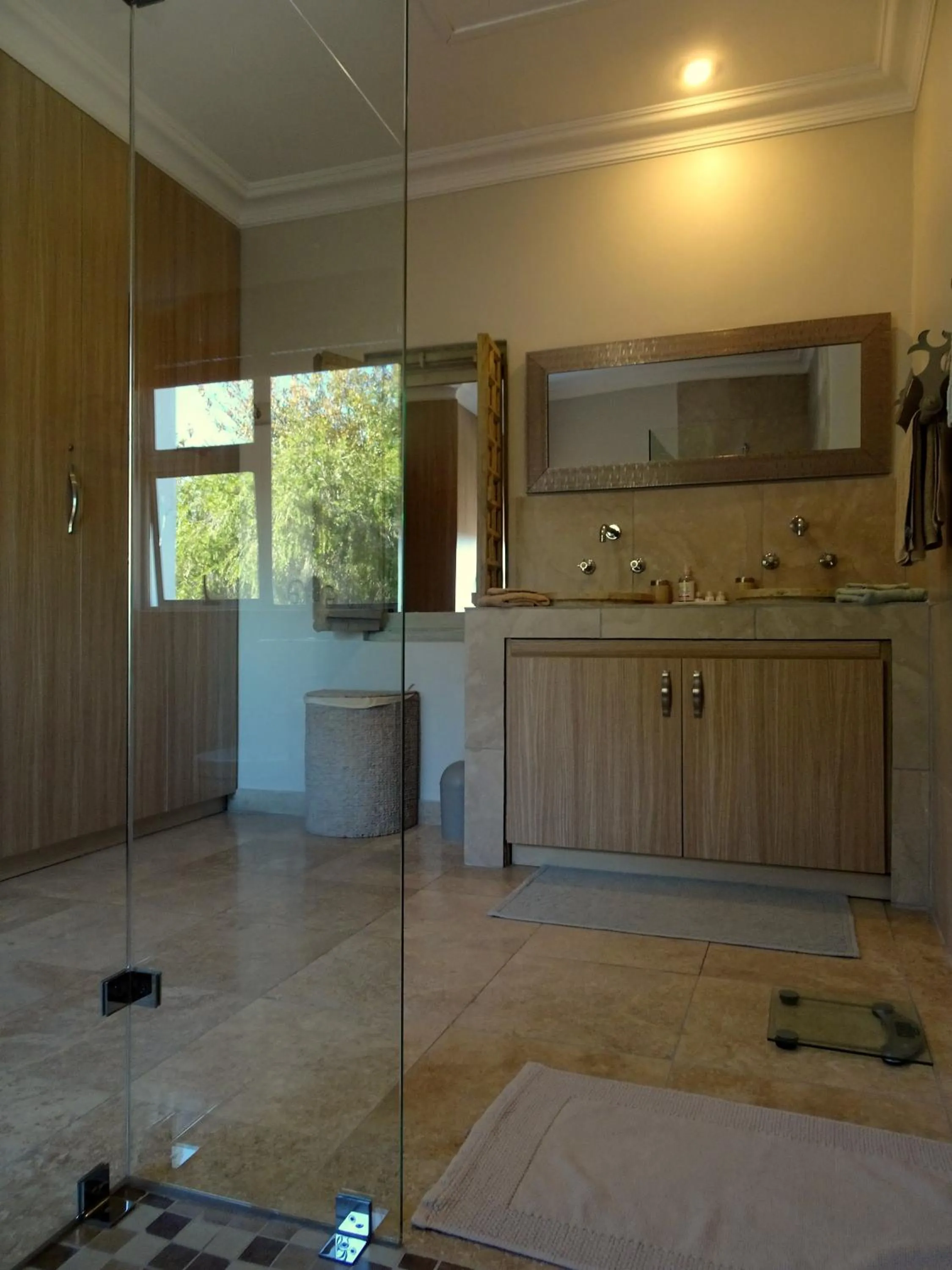 Bathroom in African Palm Cottage and Guesthouse