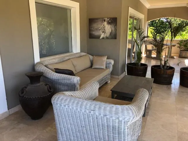 Property building in African Palm Cottage and Guesthouse