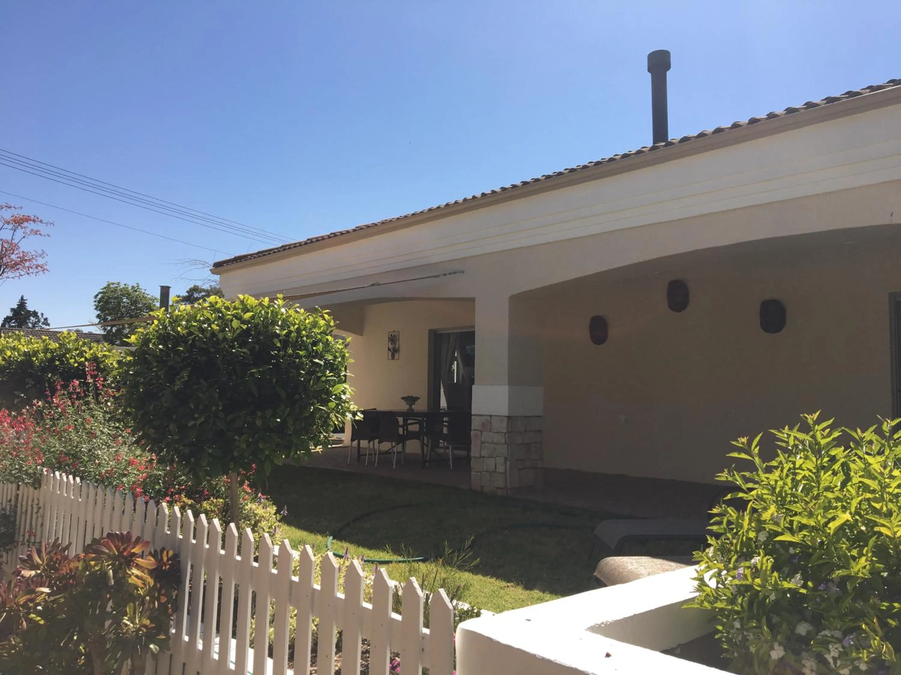 Patio in African Palm Cottage and Guesthouse