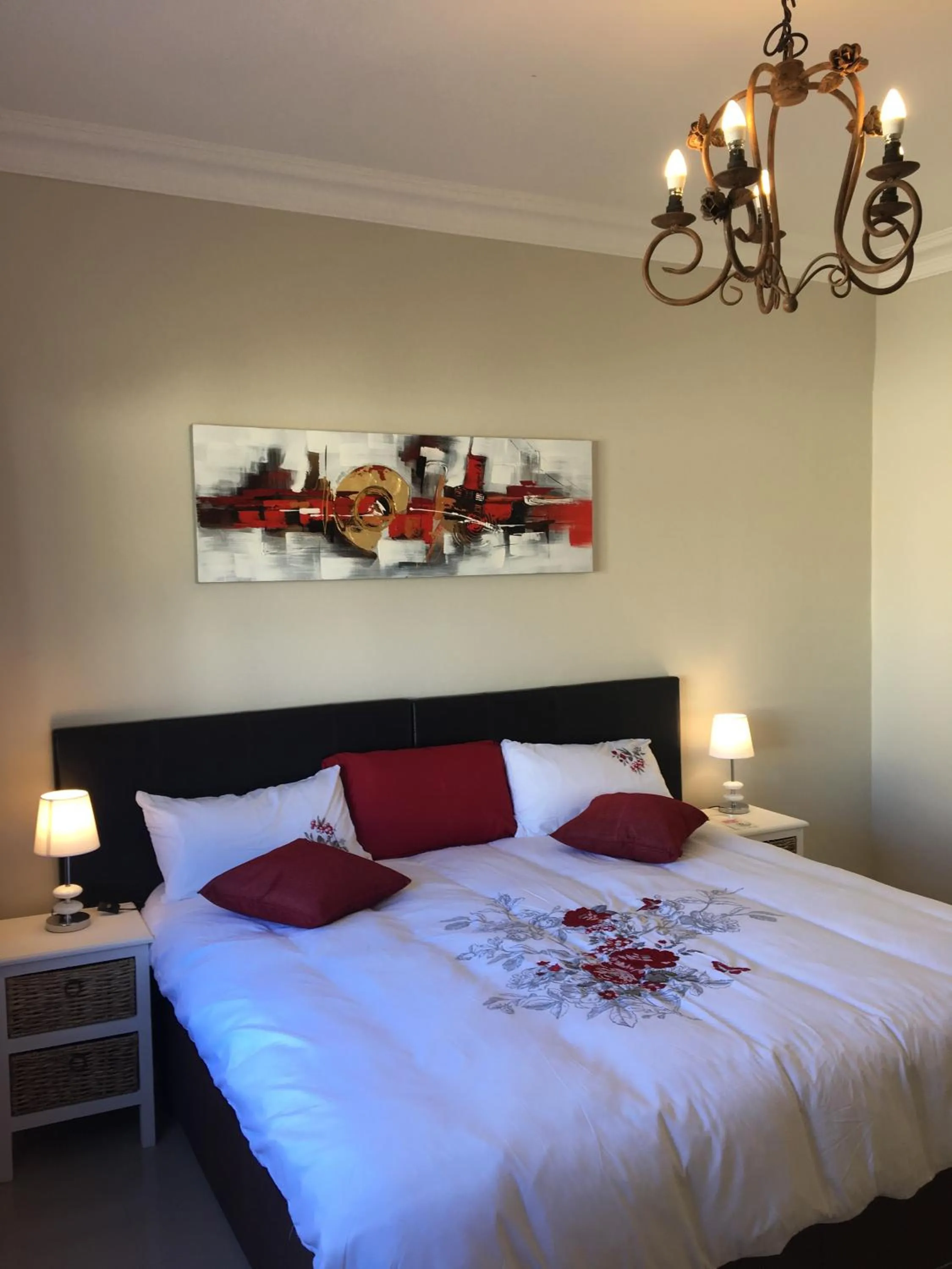 Bedroom in African Palm Cottage and Guesthouse