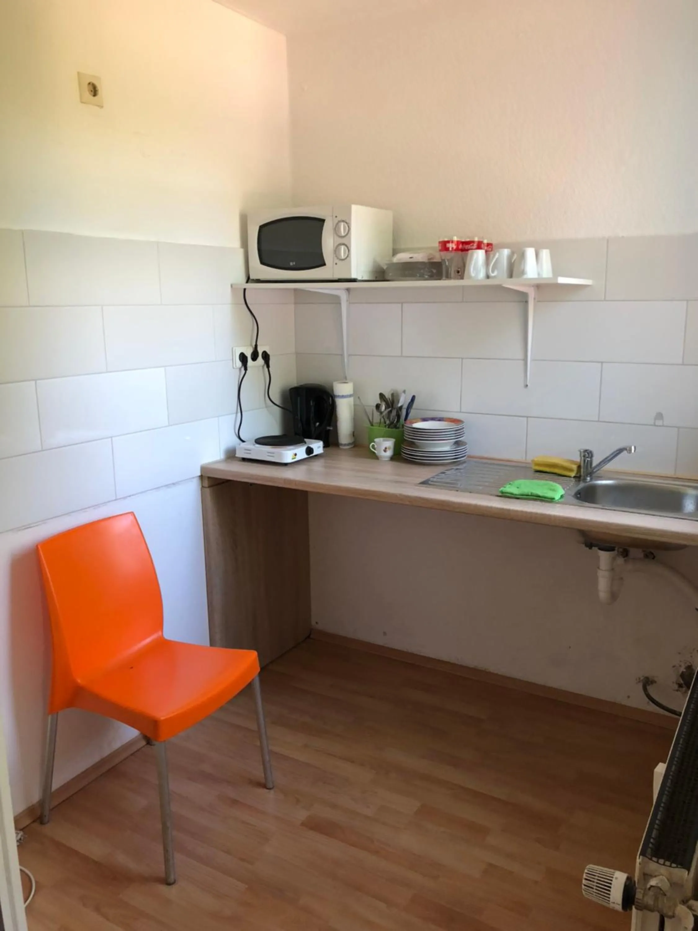 Kitchen or kitchenette in Rana's Zimmervermittlung 2