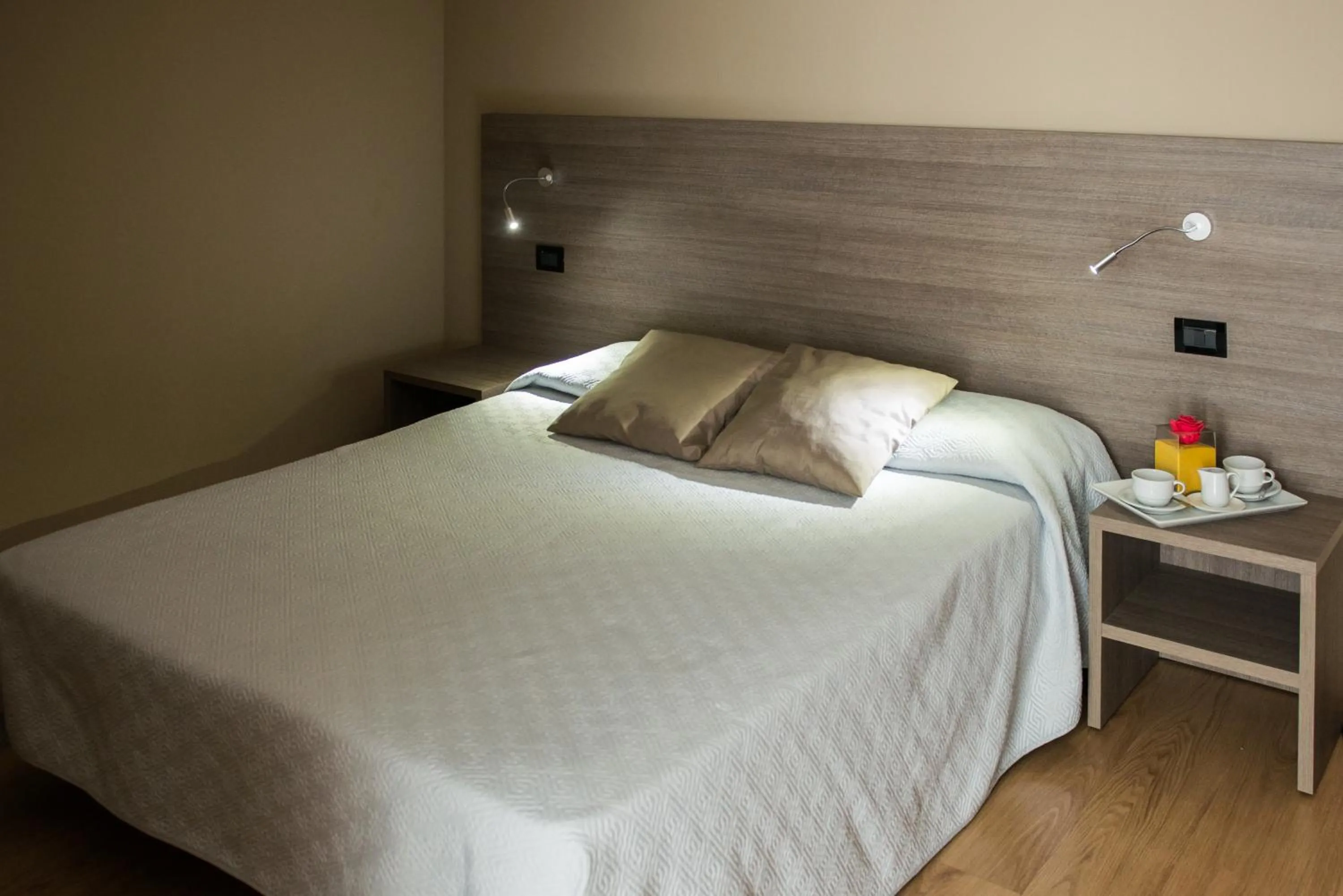 Bed in Albergo Grappolo D'oro
