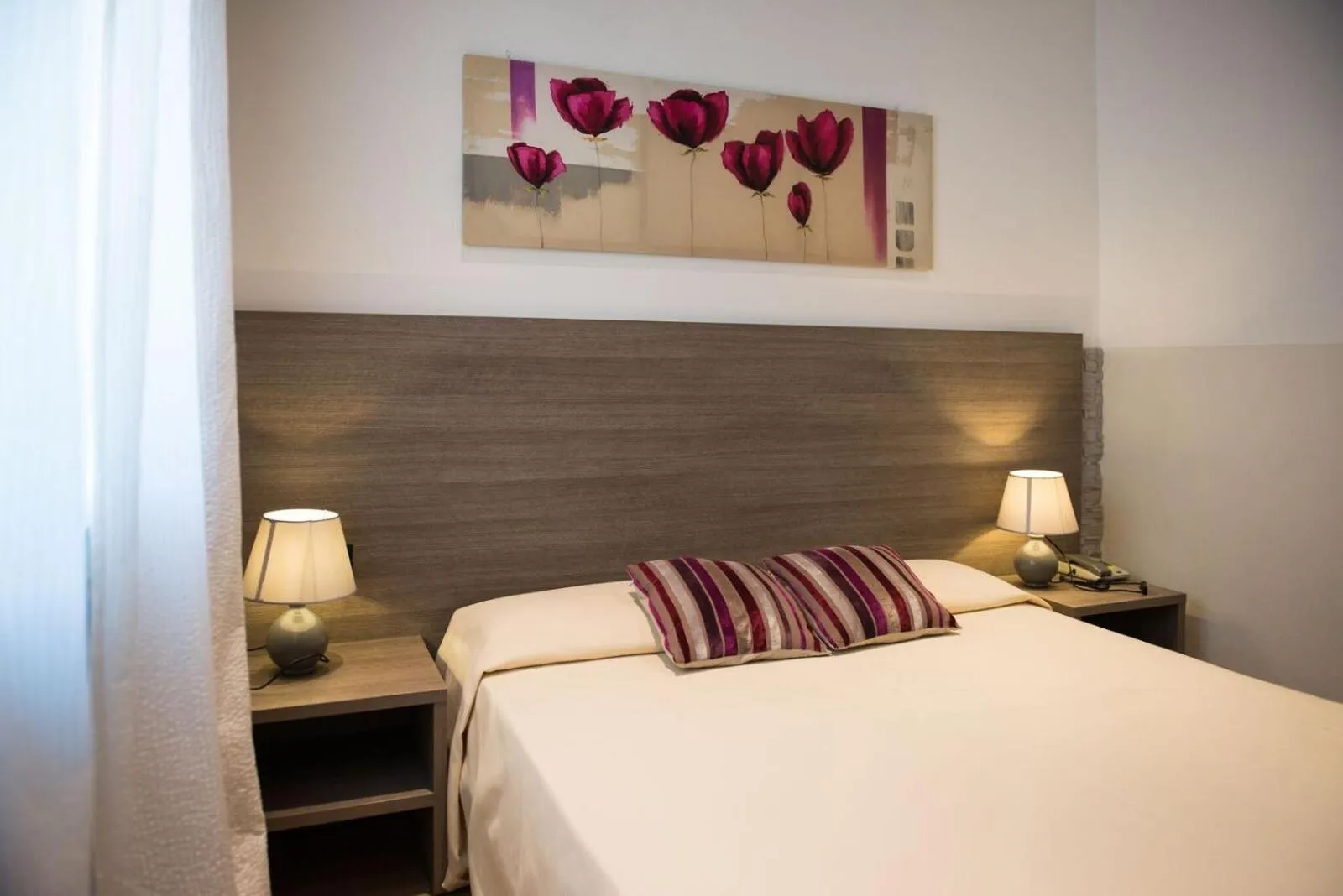 Bed in Albergo Grappolo D'oro