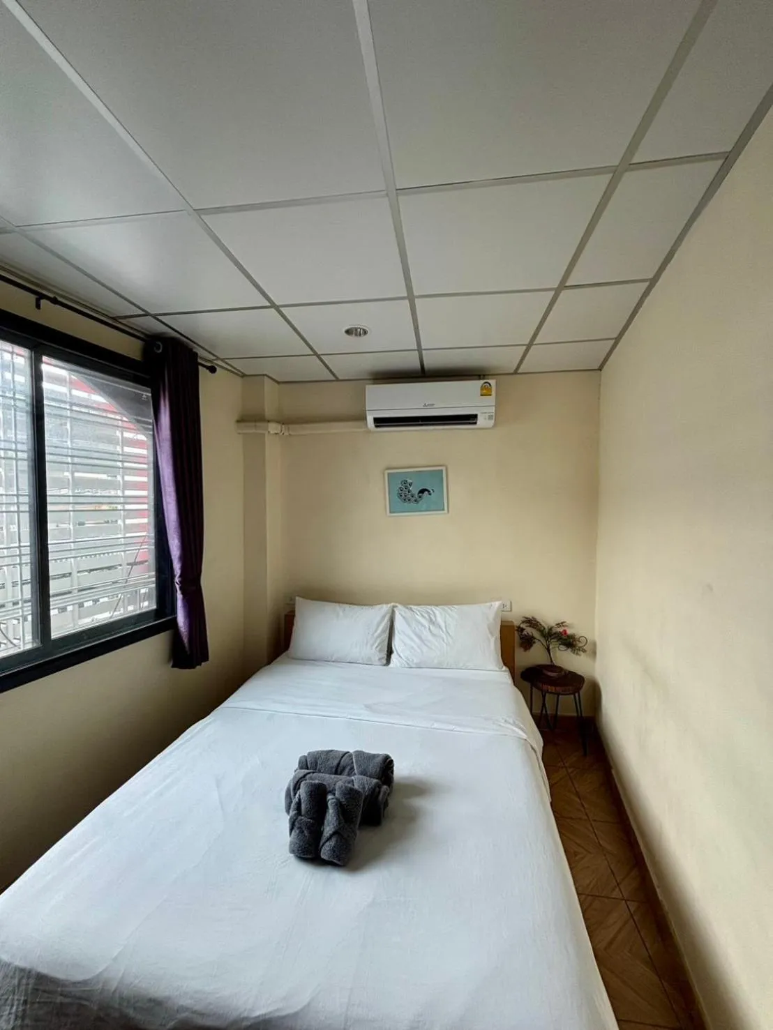 Bed in Double D Rooms & Cafe