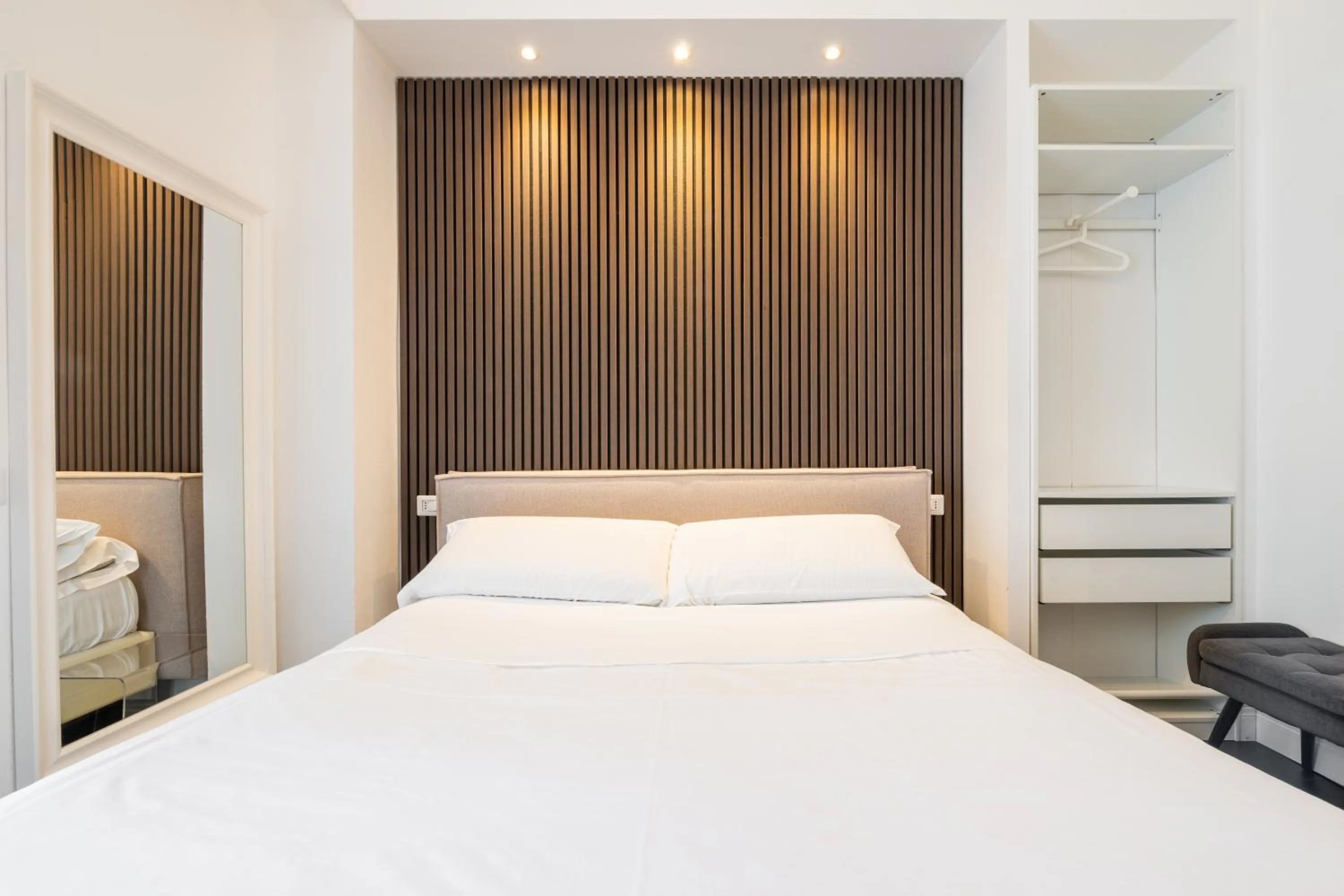 fireplace, Bed in PLEY Cagliari Boutique Suites