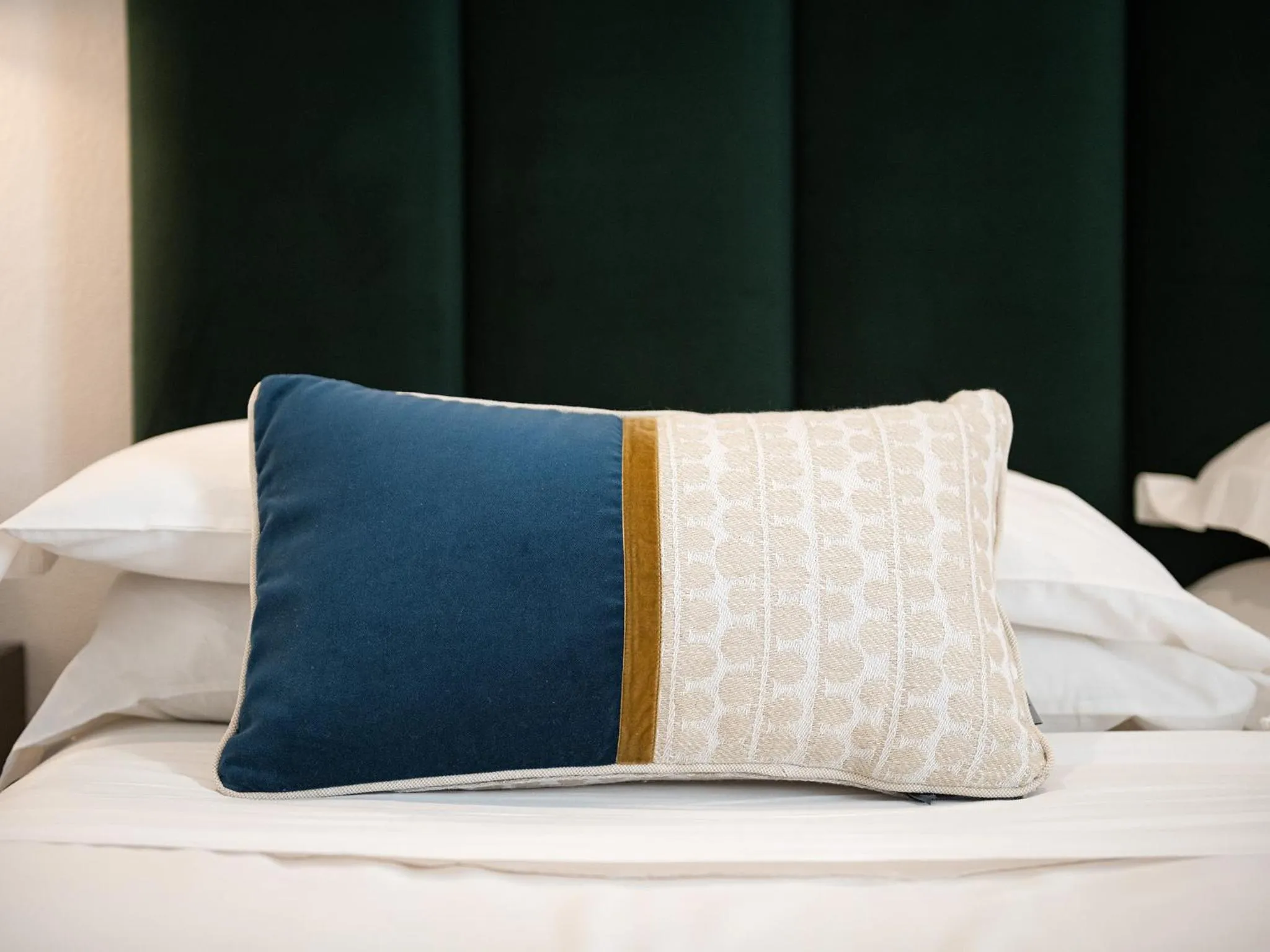 Decorative detail, Bed in PLEY Cagliari Boutique Suites