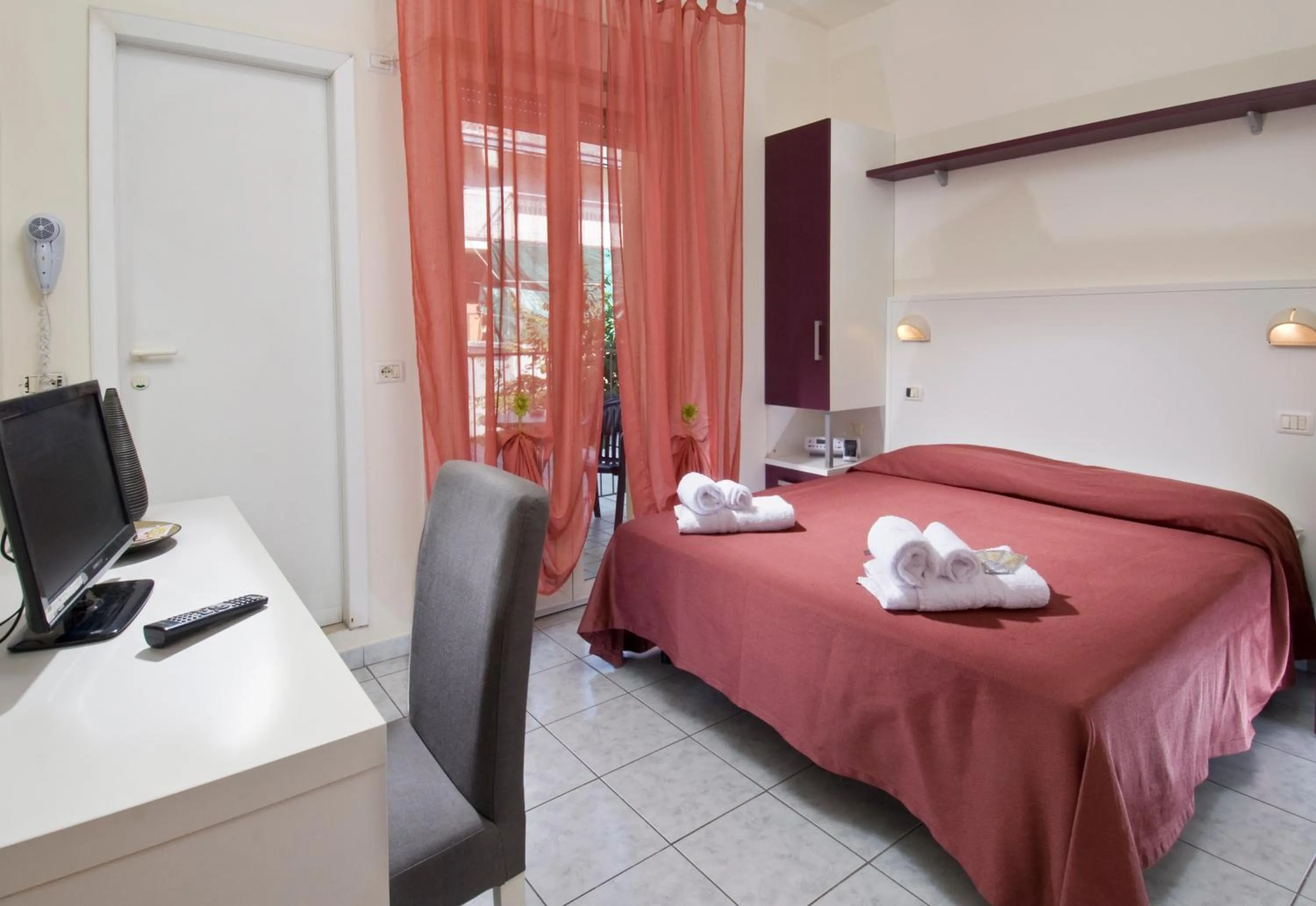 Photo of the whole room, Bed in Hotel Locanda Rosy