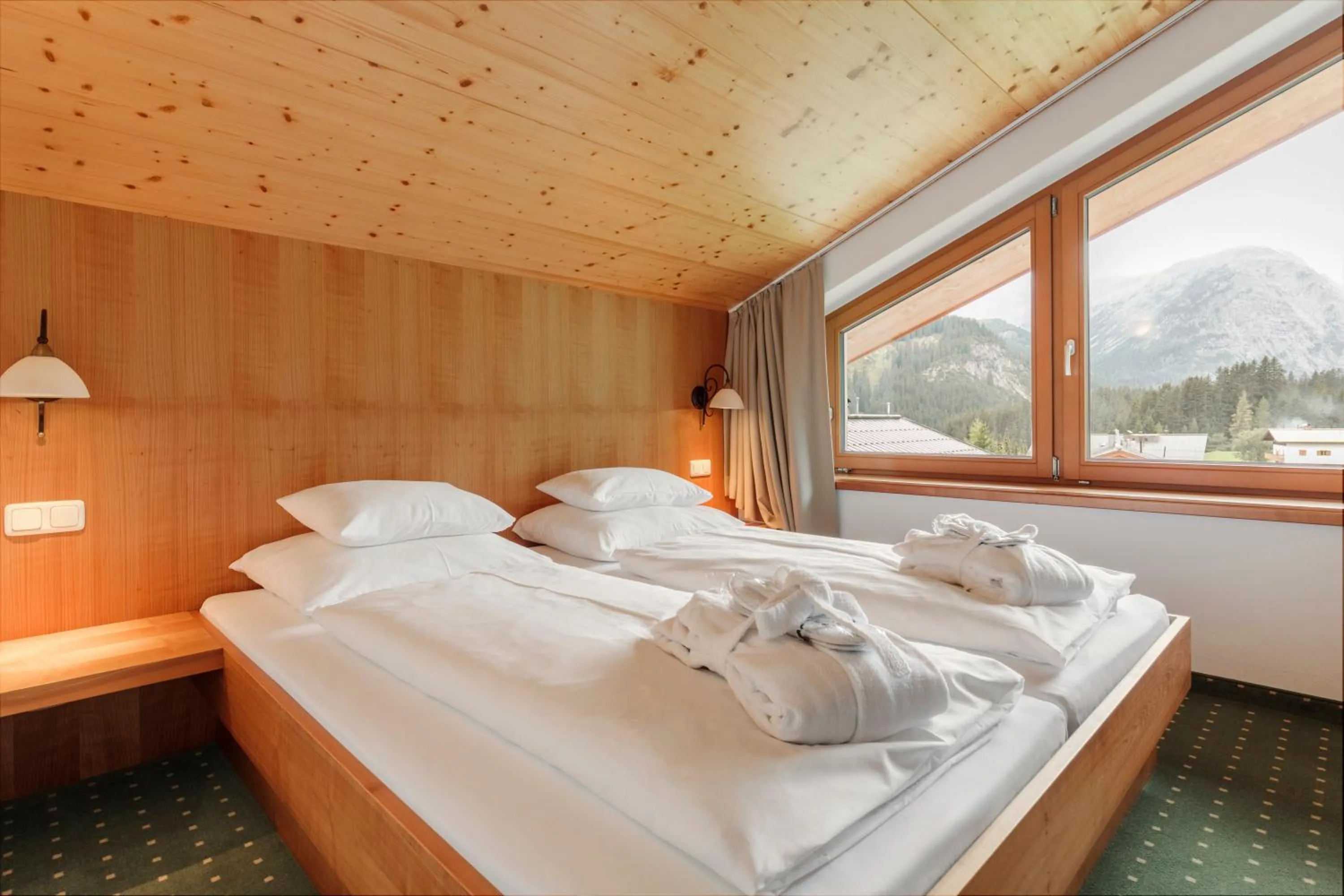 Bedroom, Bed in Hotel Schranz - Ski In & Ski Out