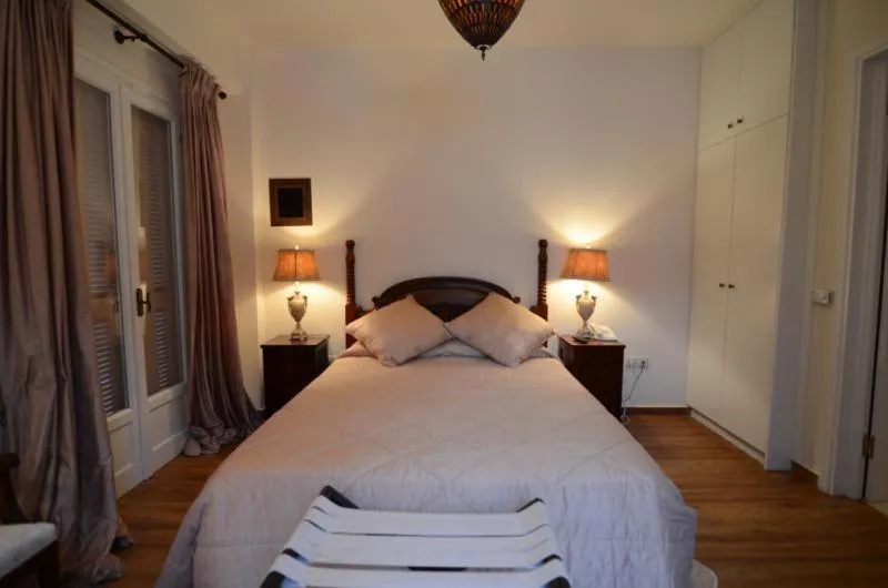 Bed in Korina Gallery Hotel