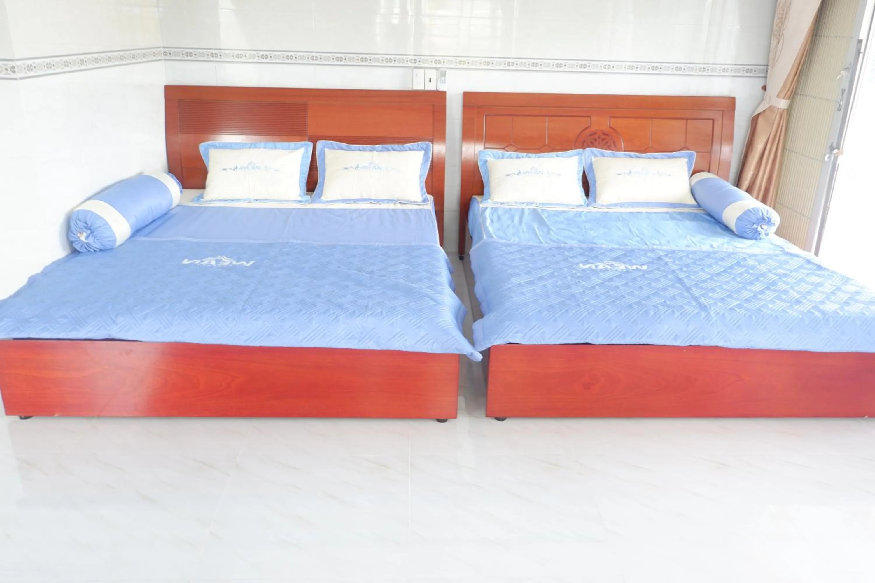 Bed in Hanh Mai Hotel