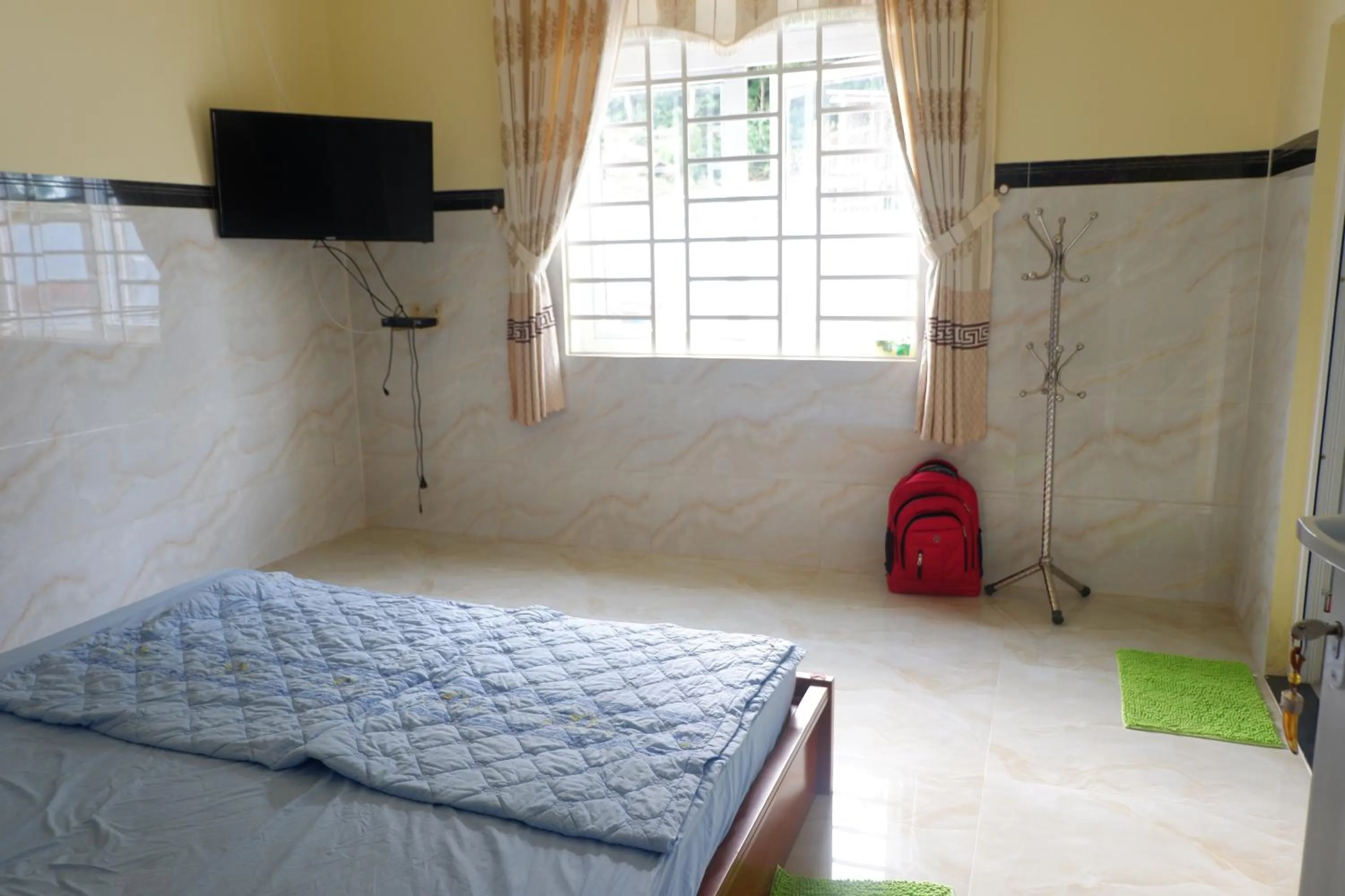 Bed in Hanh Mai Hotel