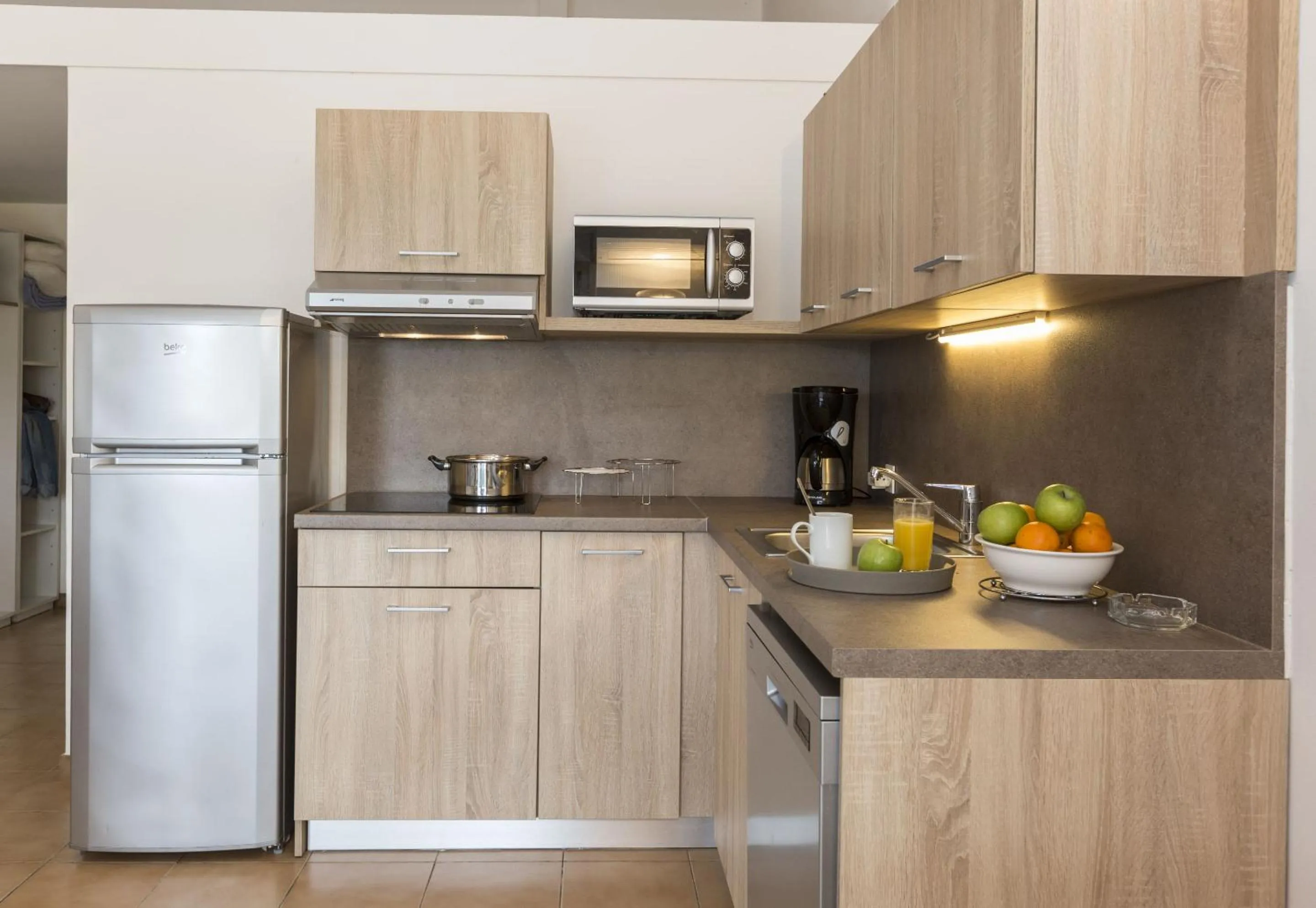 Kitchen or kitchenette in Résidence Odalys Stella di l'Aria