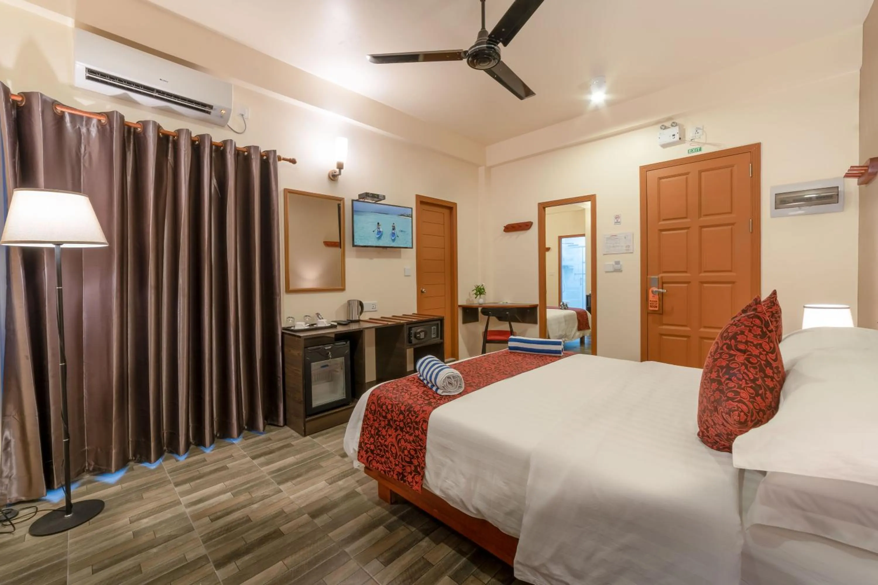 Bed in Paguro Beach Inn