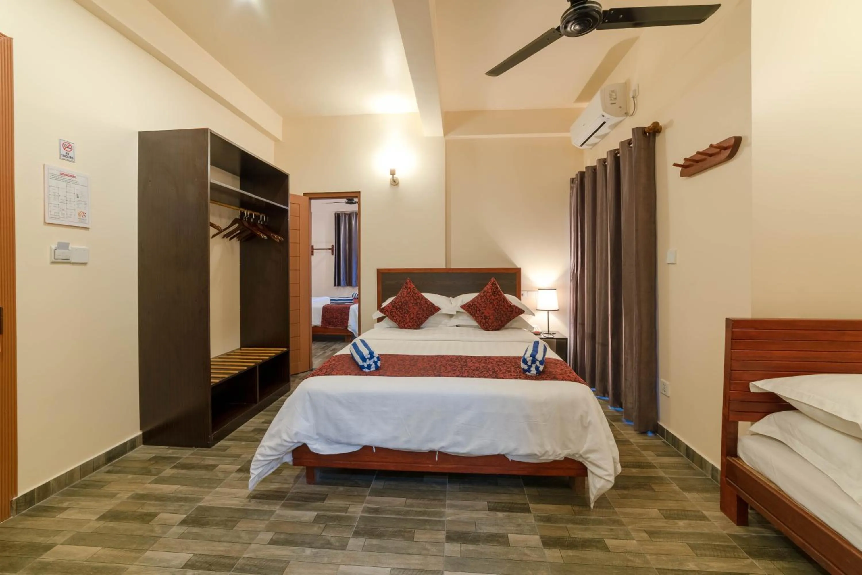 Bed in Paguro Beach Inn