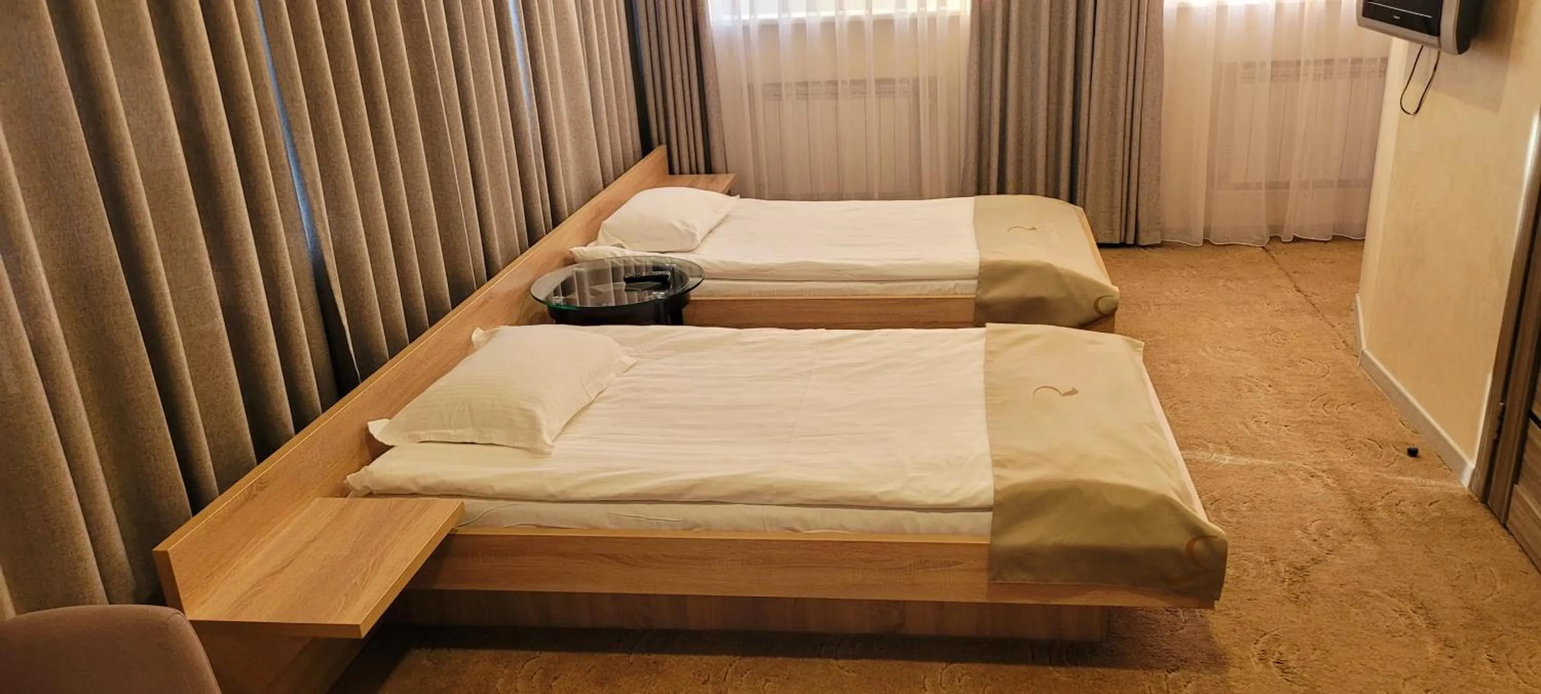 Bed in Renion Hotel