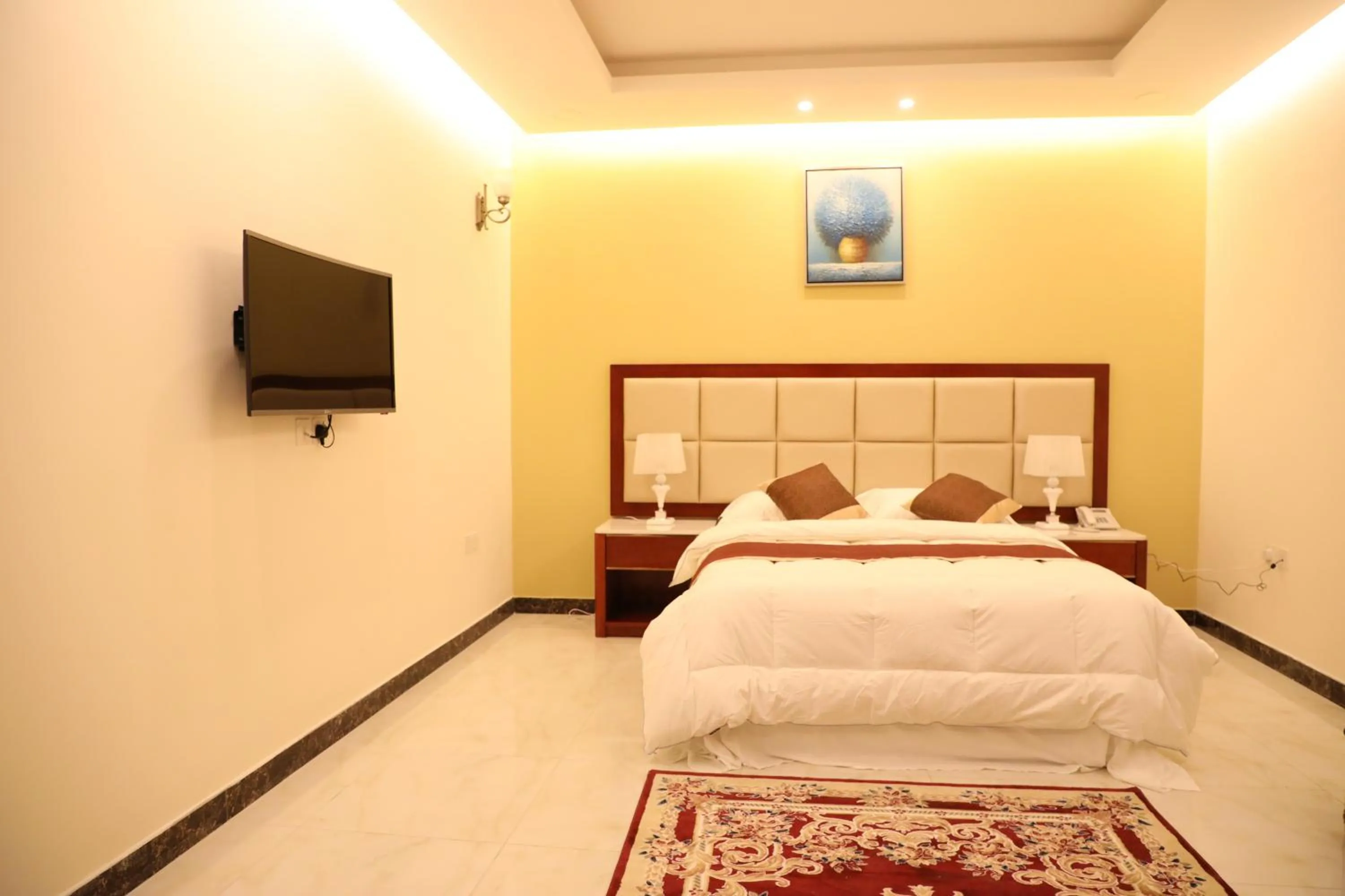 Bed in Ashbilia Suites