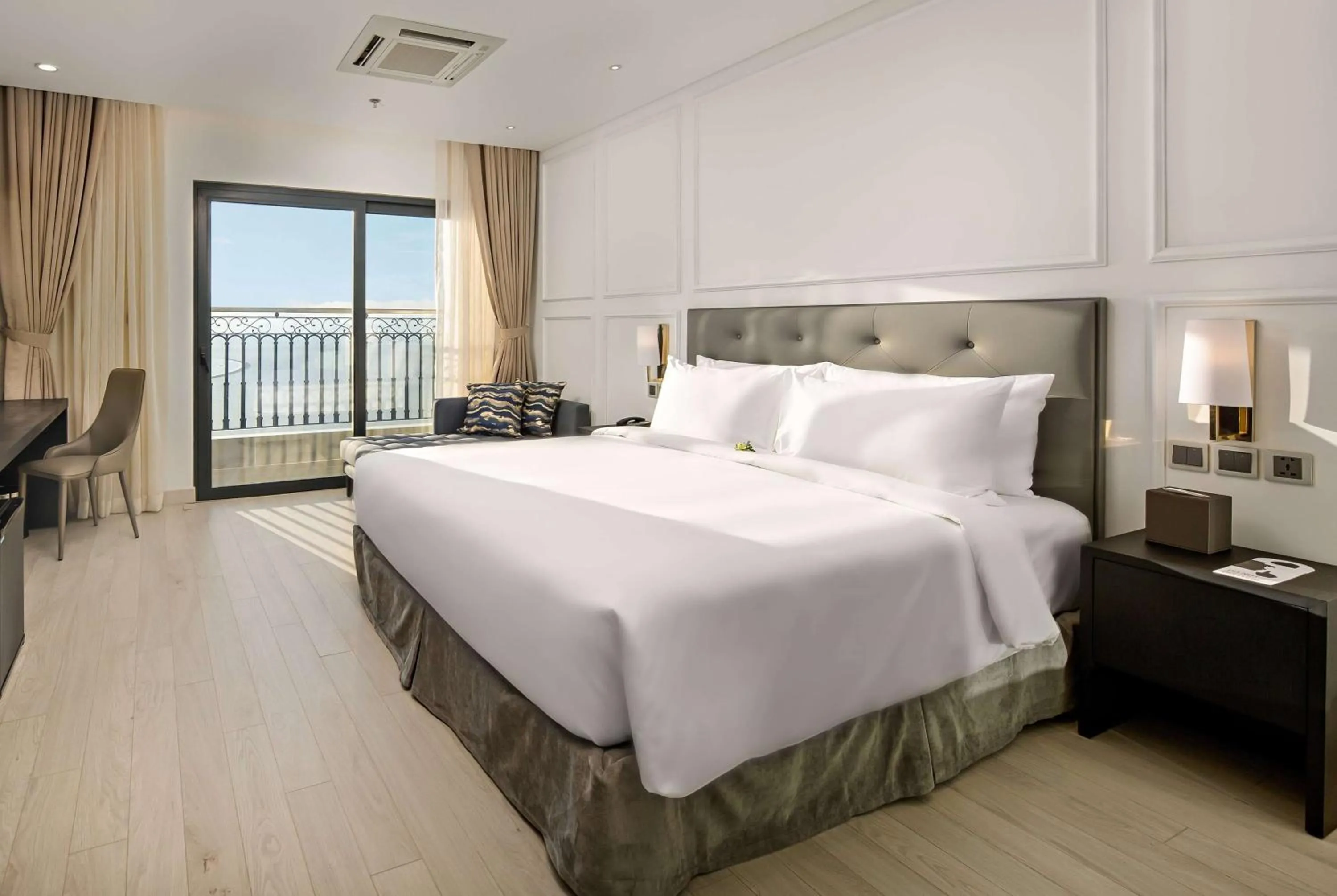 Photo of the whole room, Bed in Wyndham Danang Golden Bay - Free Shuttle Bus to Beach