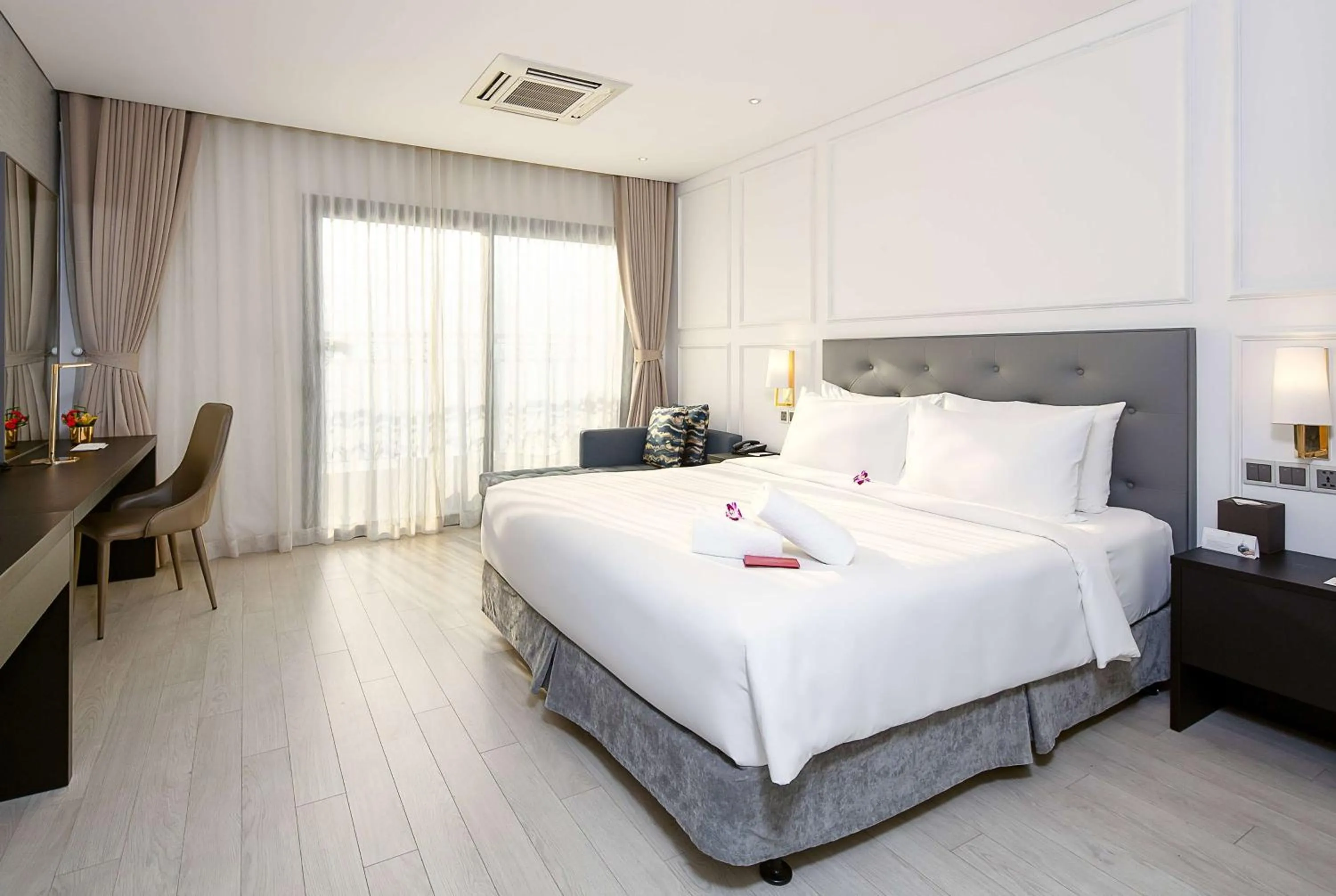 Photo of the whole room, Bed in Wyndham Danang Golden Bay - Free Shuttle Bus to Beach