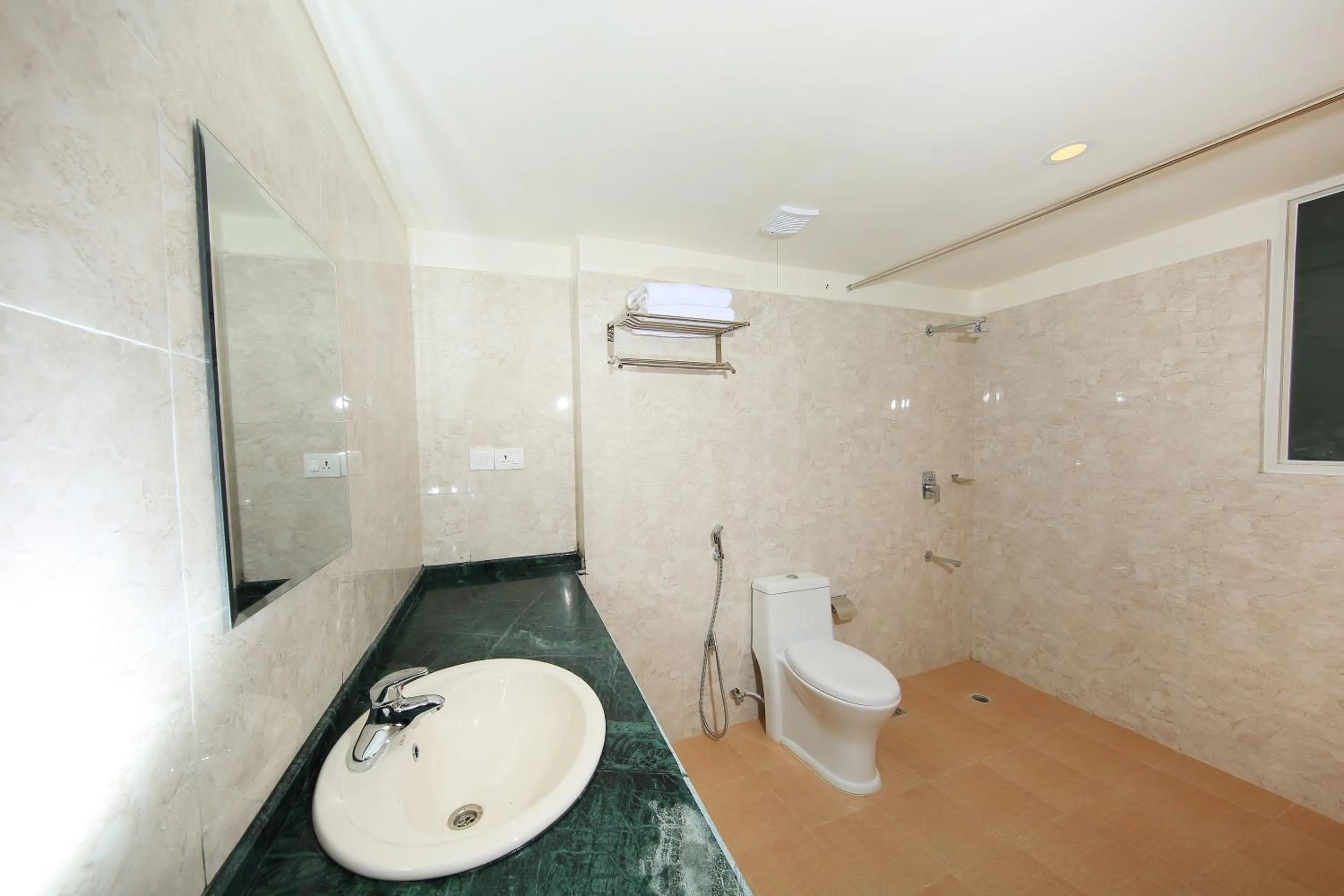 Bathroom in Hotel Next Home formerly Hotel Royal Suite