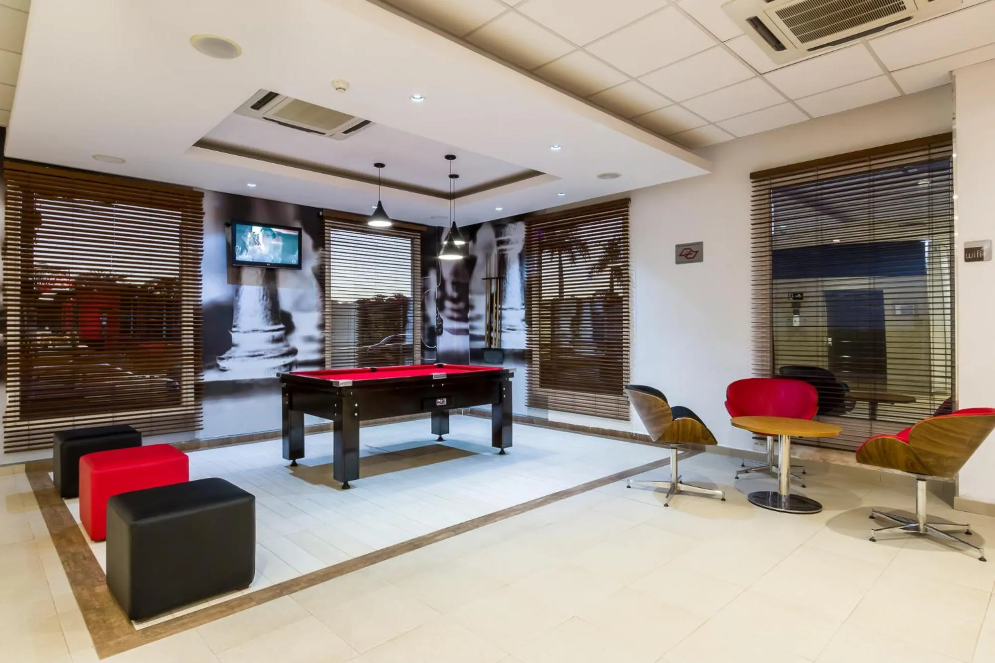 Communal lounge/ TV room in ibis Barretos