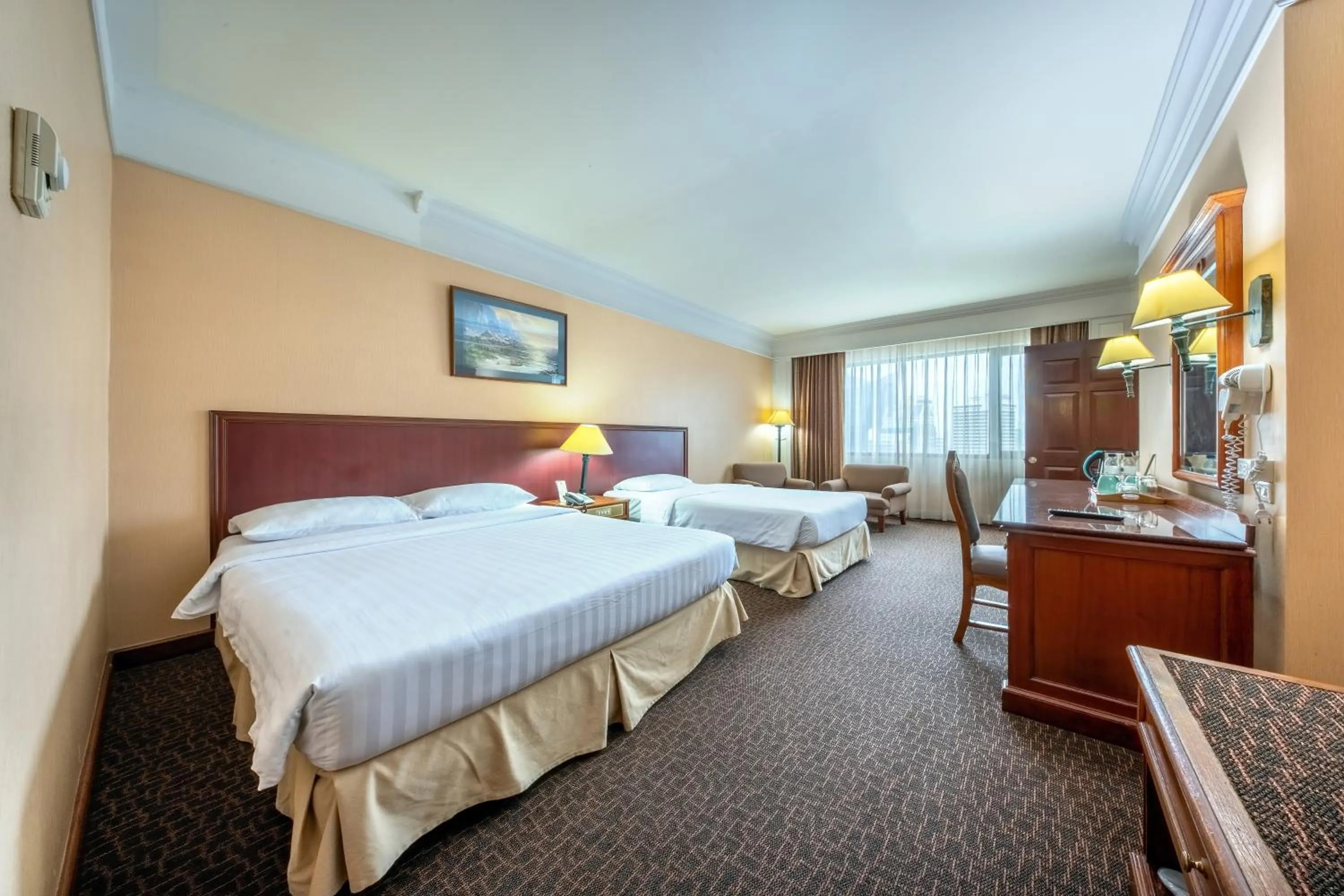 Bed in Royal Benja Hotel - Big Room Family-Friendly